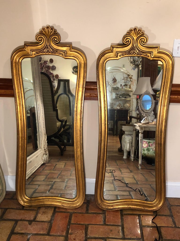 Pair of Hollywood Regency Gilt Mirrors at 1stDibs