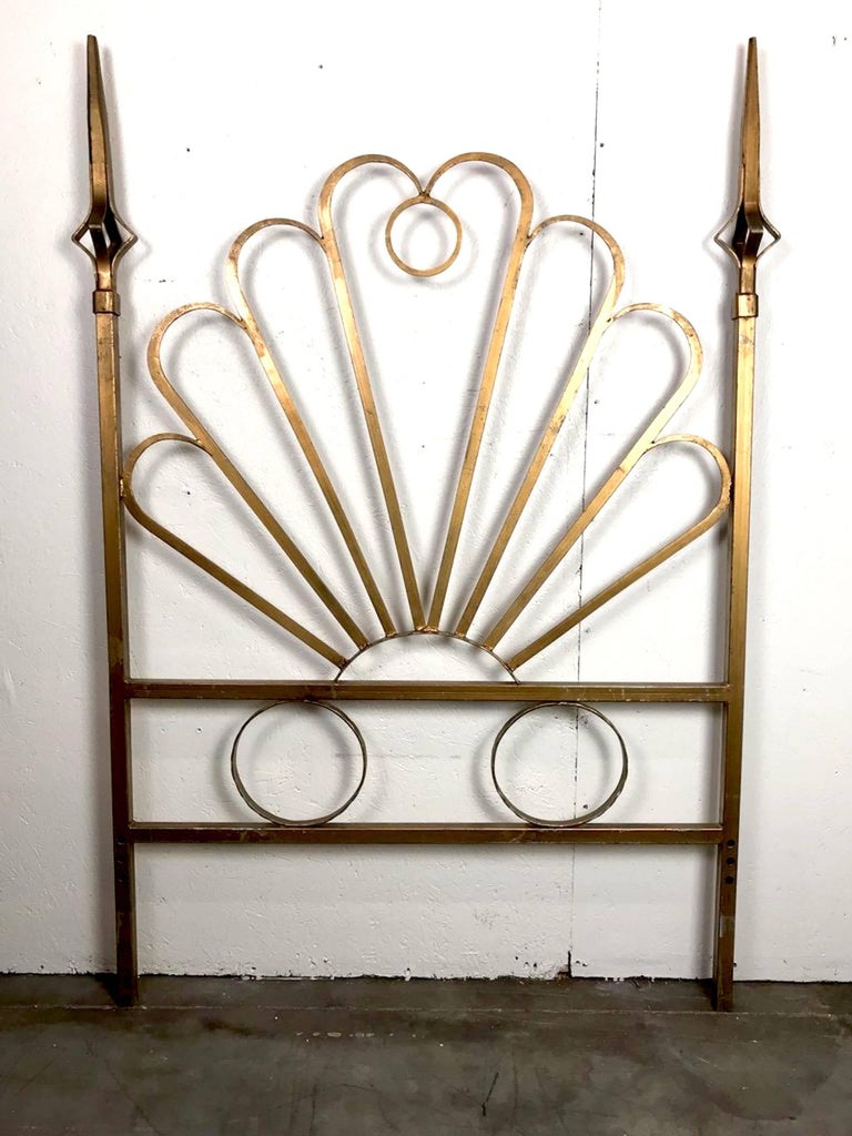 Pair of Hollywood Regency gilt twin headboards, each one standing 57 H or 69