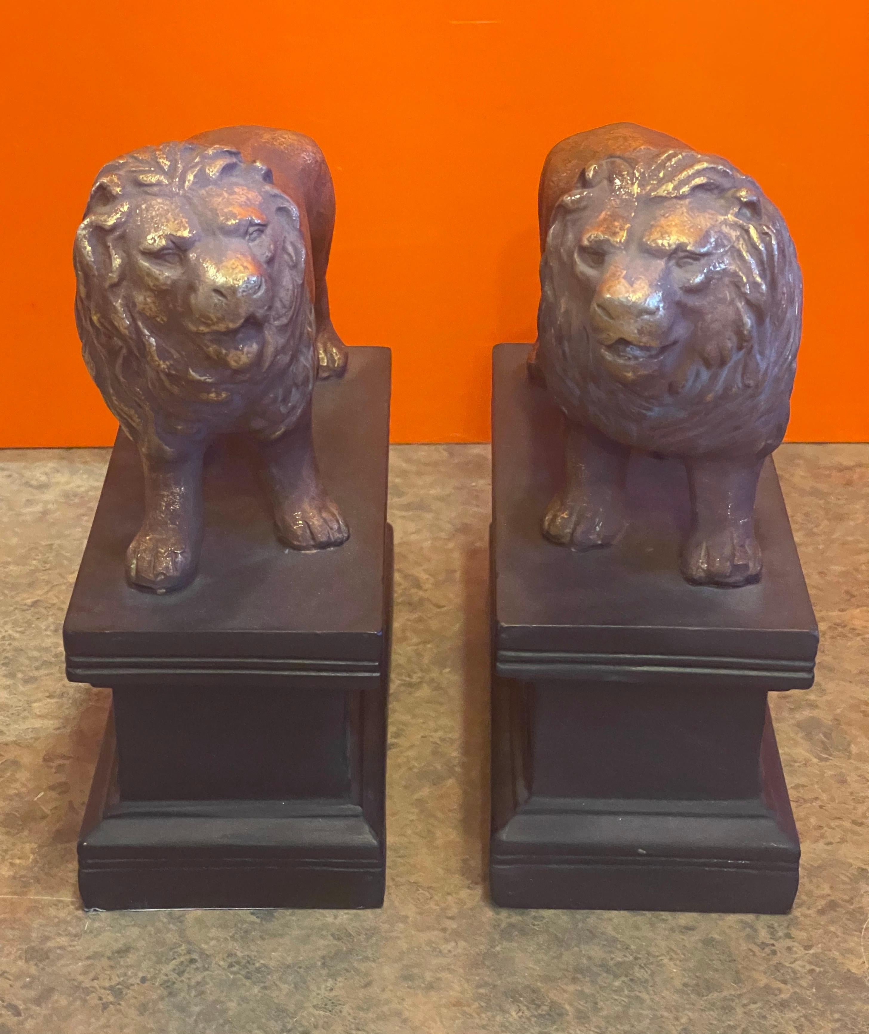 Cast Pair of Hollywood Regency Gold Gilt Lion Bookends  For Sale