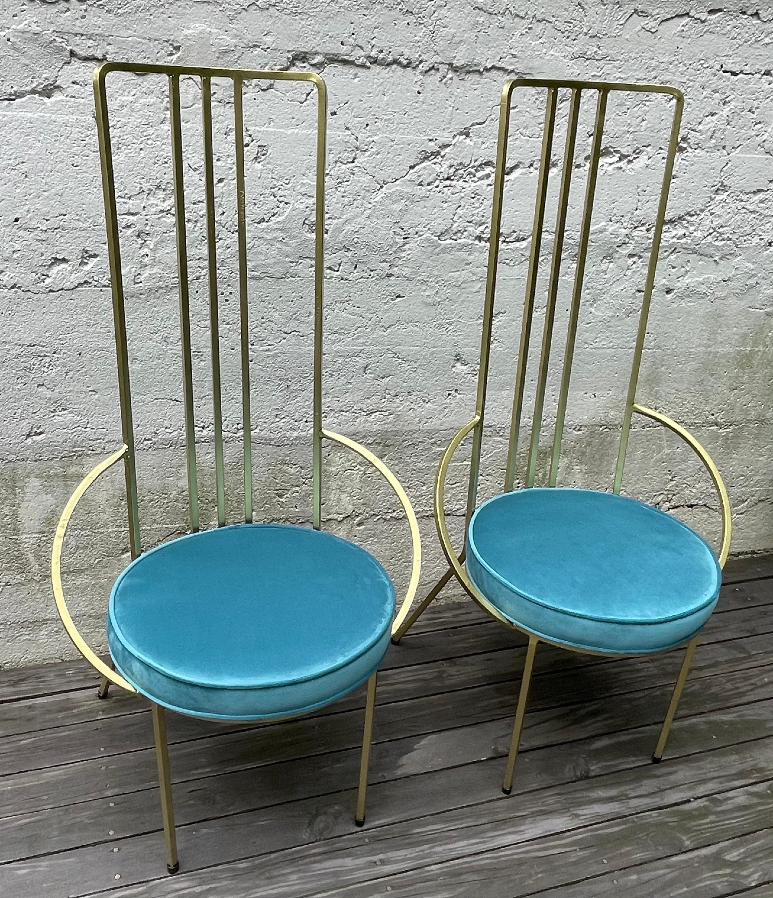 Very cool pair of Hollywood Regency iron side chairs in gold leaf with vibrant blue velvet seats, freshly painted and reupholstered.
