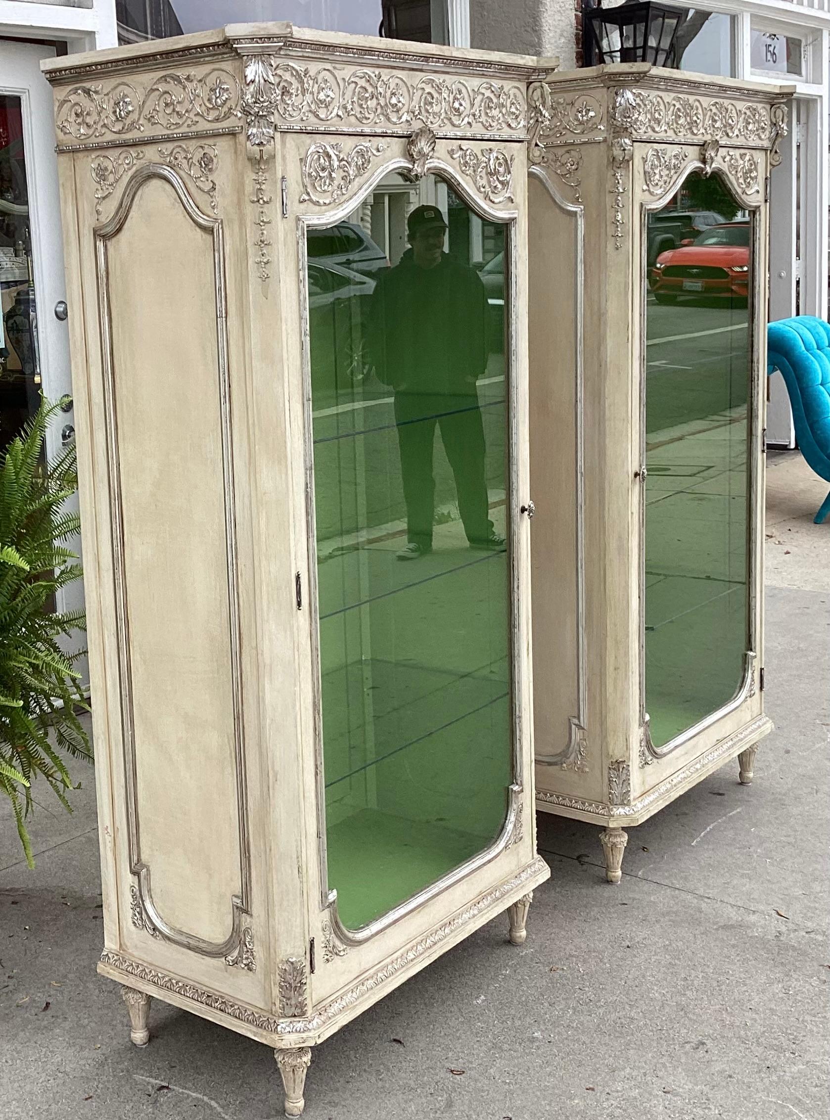 American Pair of Hollywood Regency Silver Giltwood & Paint Decorated Display Cabinets