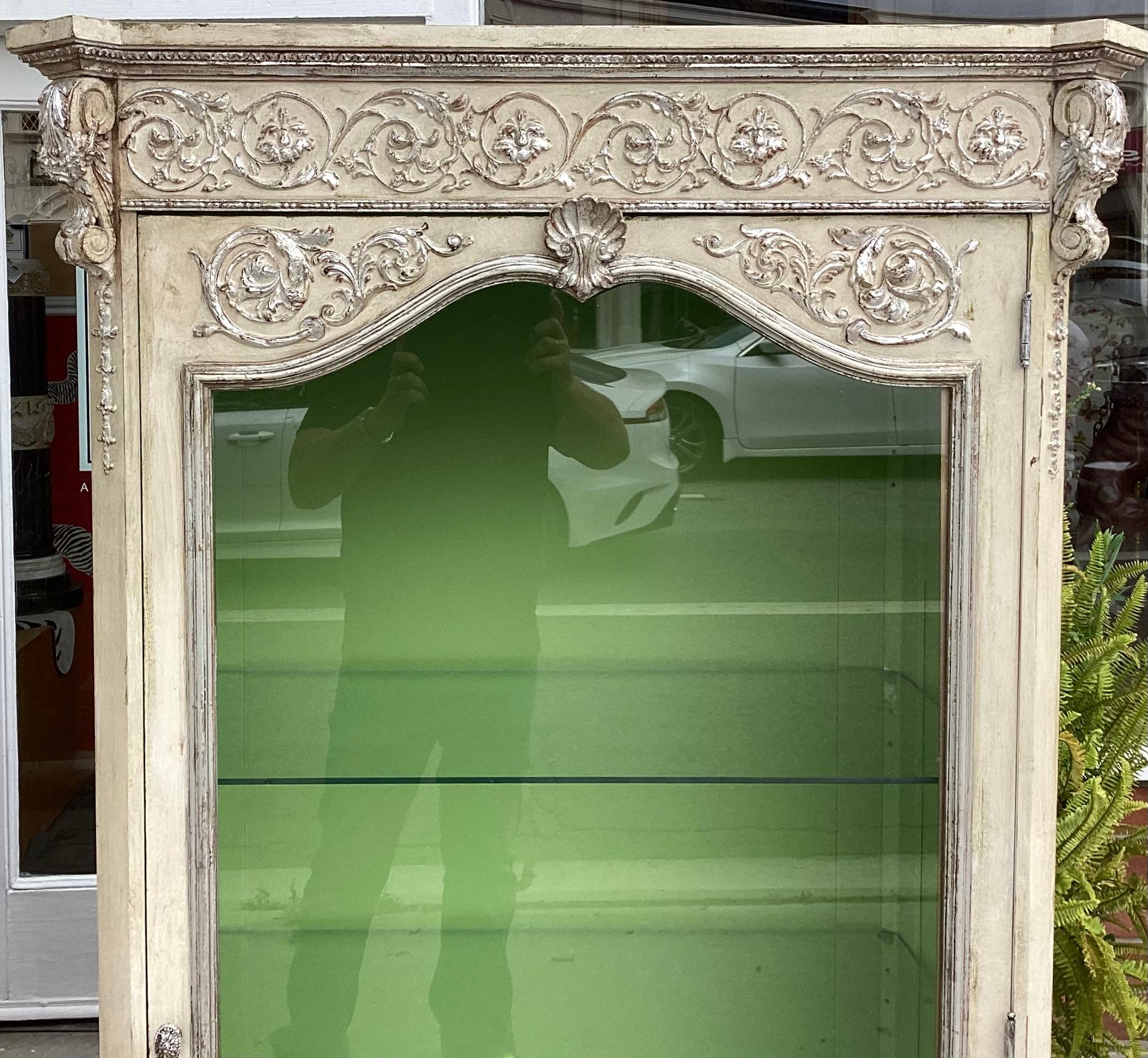 Glass Pair of Hollywood Regency Silver Giltwood & Paint Decorated Display Cabinets