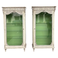 Pair of Hollywood Regency Silver Giltwood & Paint Decorated Display Cabinets