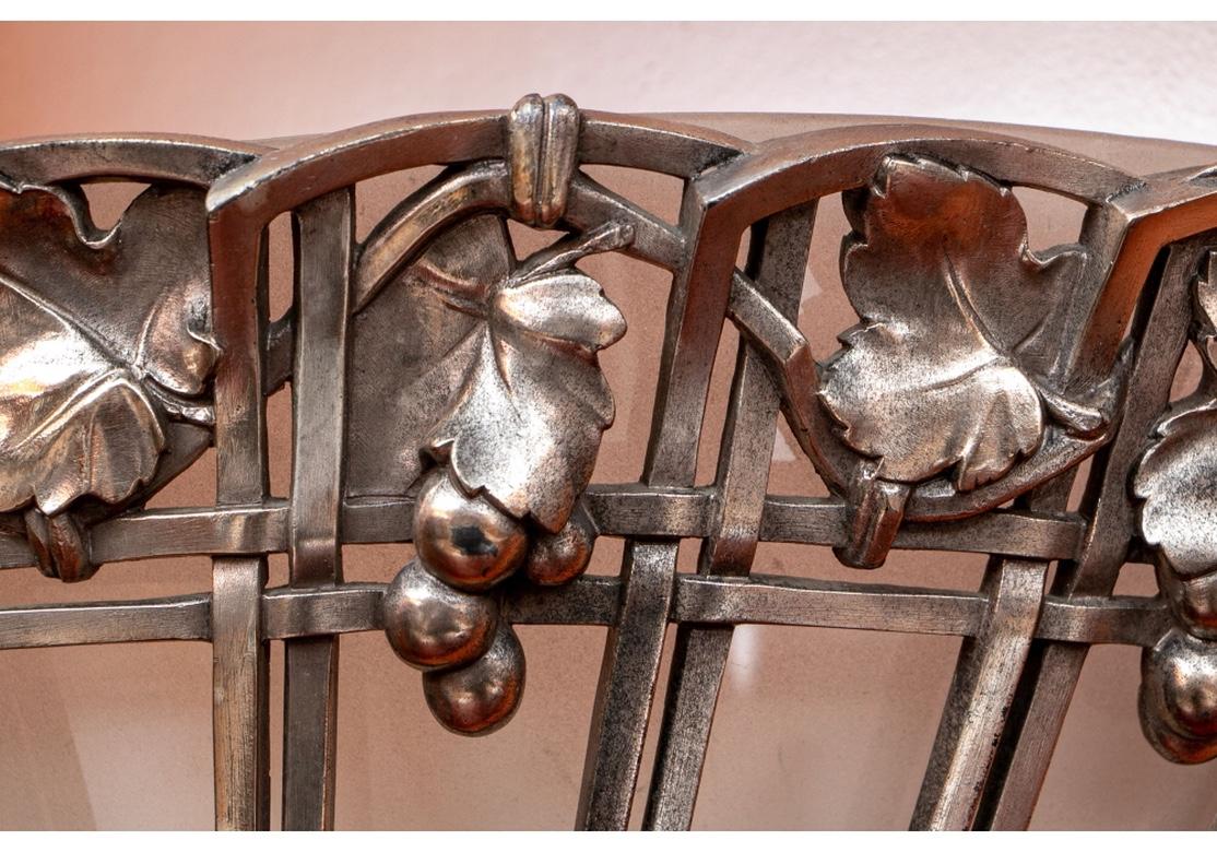 Mid-20th Century Pair of Hollywood Regency Silvered Bronze Wall Sconces For Sale