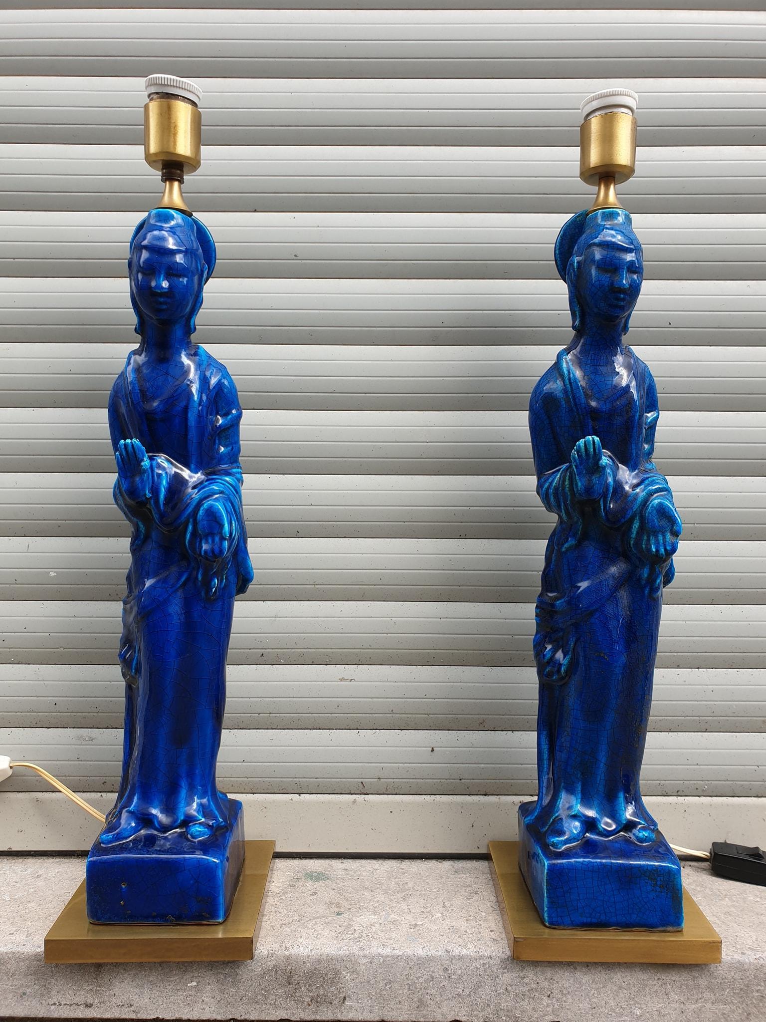 Amazing pair of Ugo Zaccagnini, gold brass base and blue ceramic Chinese Buddha lamps, circa 1950 by Designer Ugo Zaccagnini. Made in Italy.
Beautiful unique pair of matching lamps.
Measures: Height with shade 90 cm,
Diameter shade 34 cm., width