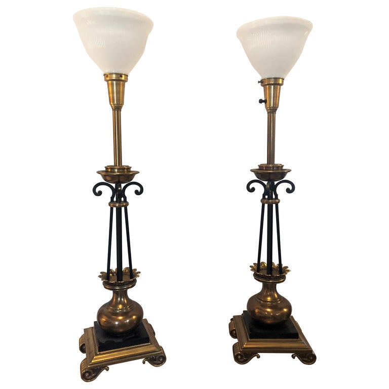 Pair of Hollywood Regency Stiffel Co. Brass and Ebonized Column Form