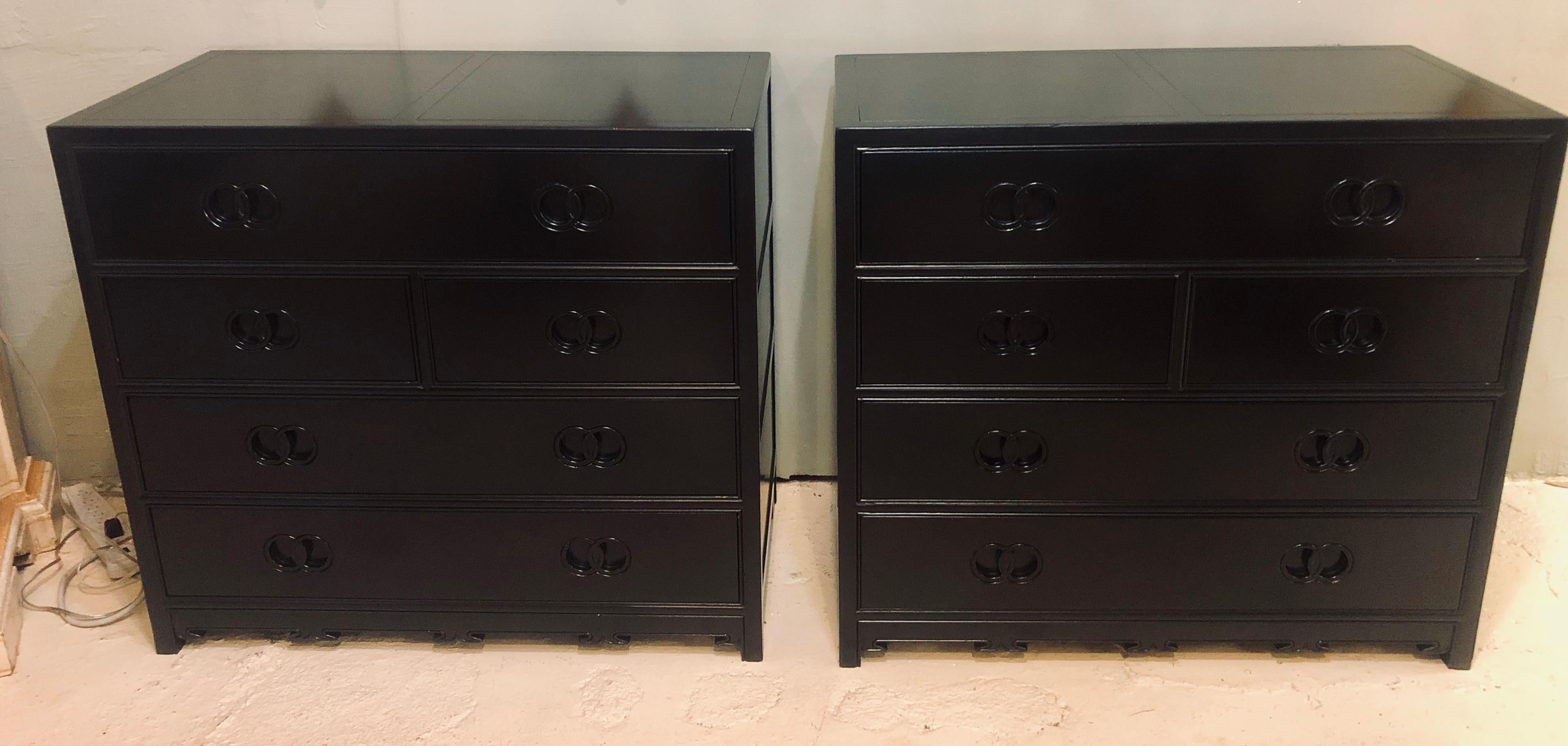 Pair of Hollywood Regency style Ebony Michael Taylor designed chests for baker. This stunning Steinway black lacquered chests, commodes or nightstands have been professionally done over and are simply spectacular. The large five drawer chests having