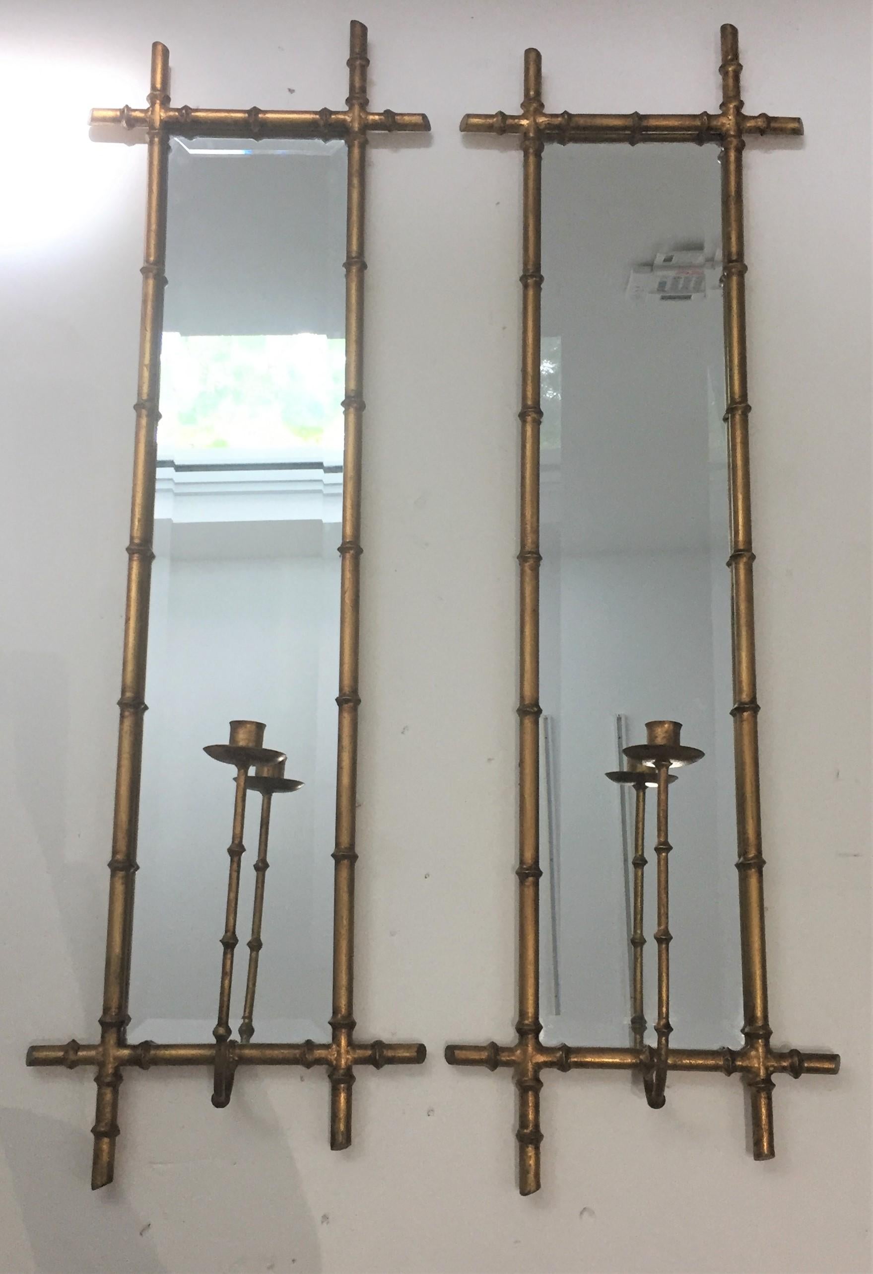 This stylish pair of wall mount candle scones are very much in the Hollywood Regency style so coveted by Tony Duquette and could easily be electrified.

Please note that the 2nd and last pictures show both actual sconces side by side.