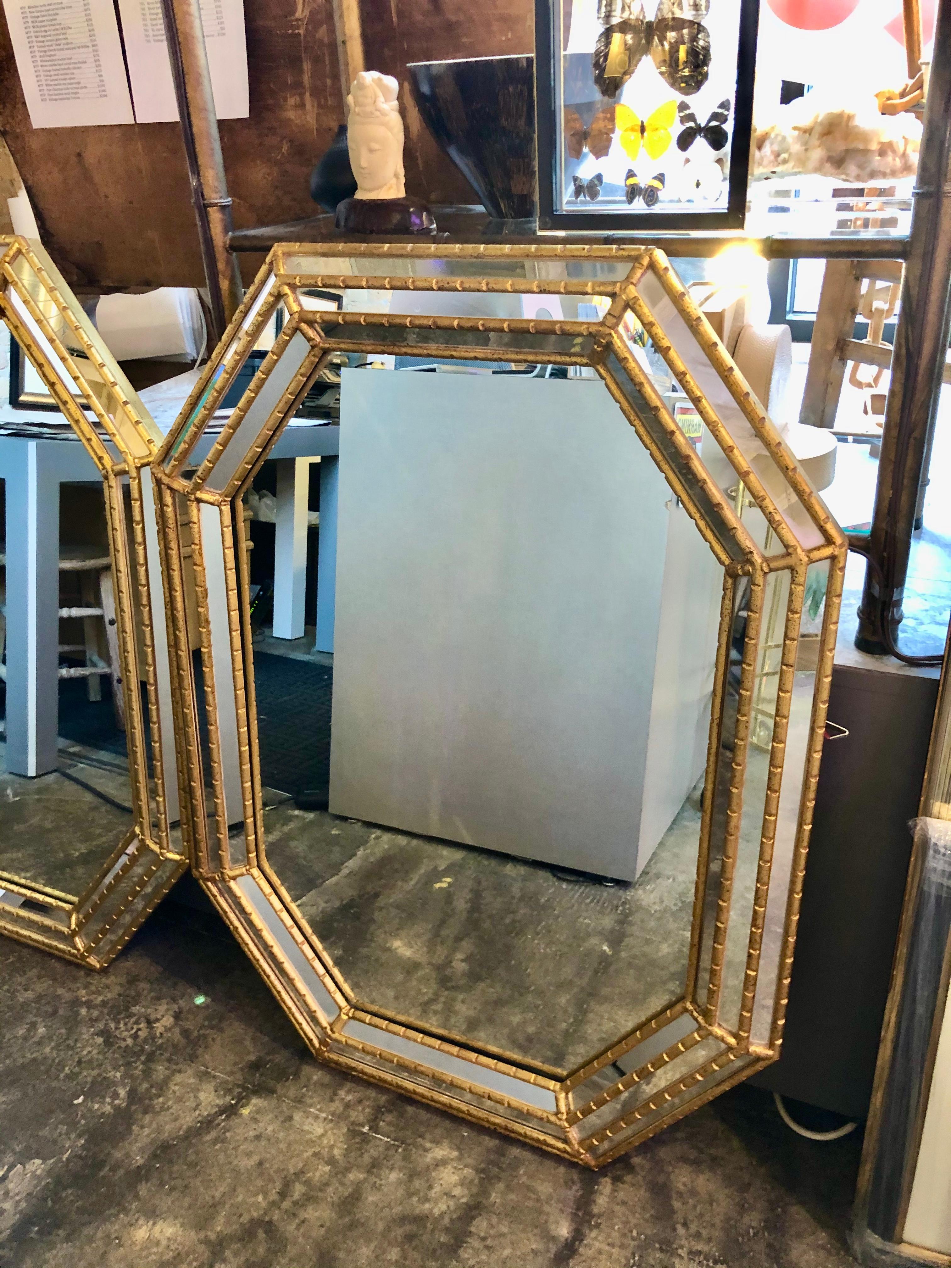 Pair of gilt faux bamboo octagonal wall mirrors by La Barge of Holland, Michigan. Older labels are affixed to back.