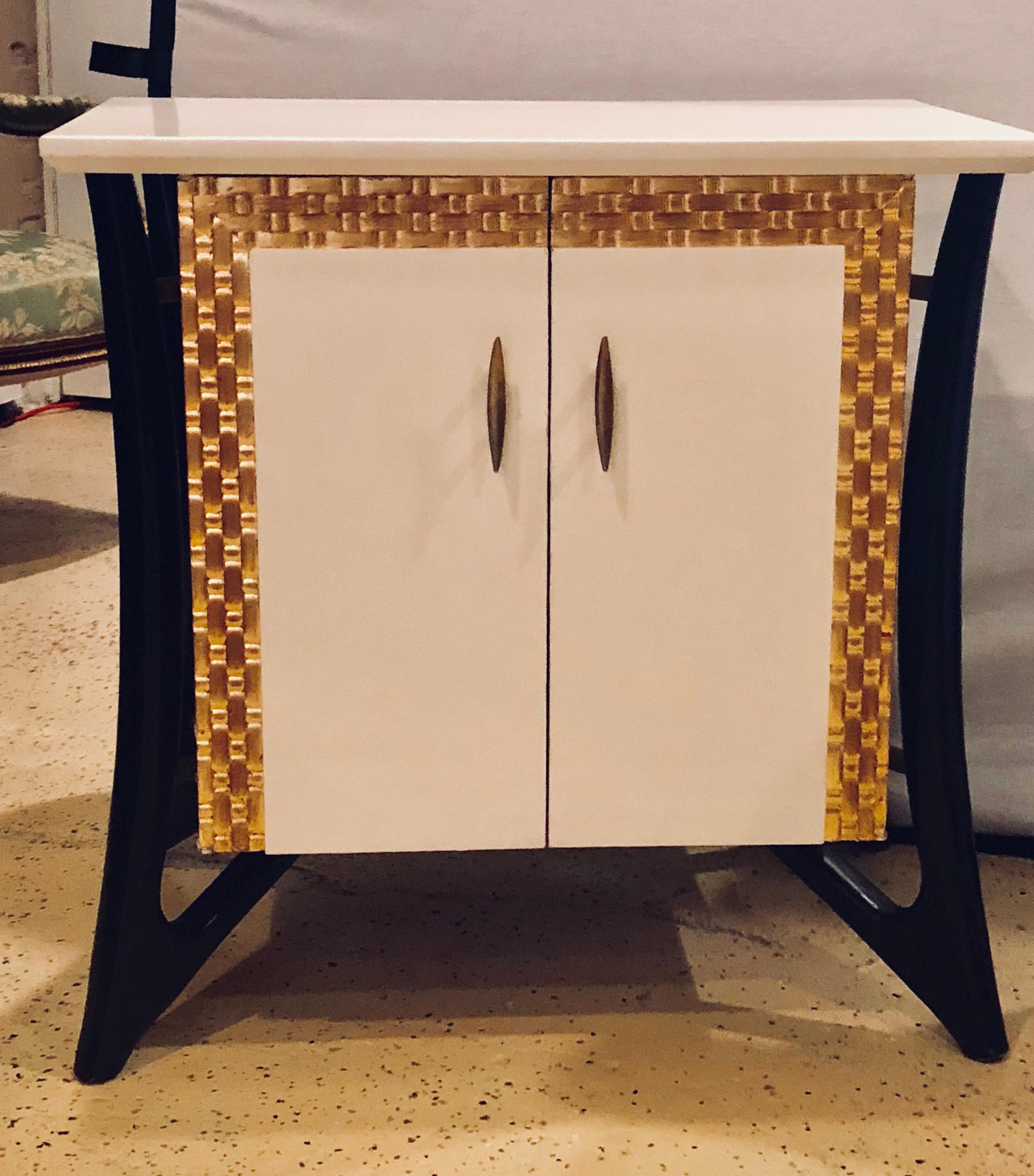 A Fine pair of 1940s custom quality Hollywood Regency style parcel paint and gilt decorated night stands / end tables. This is simply a stunning pair of recently decorated and refinished night stands or end tables in the Mid-Century Modern flair.