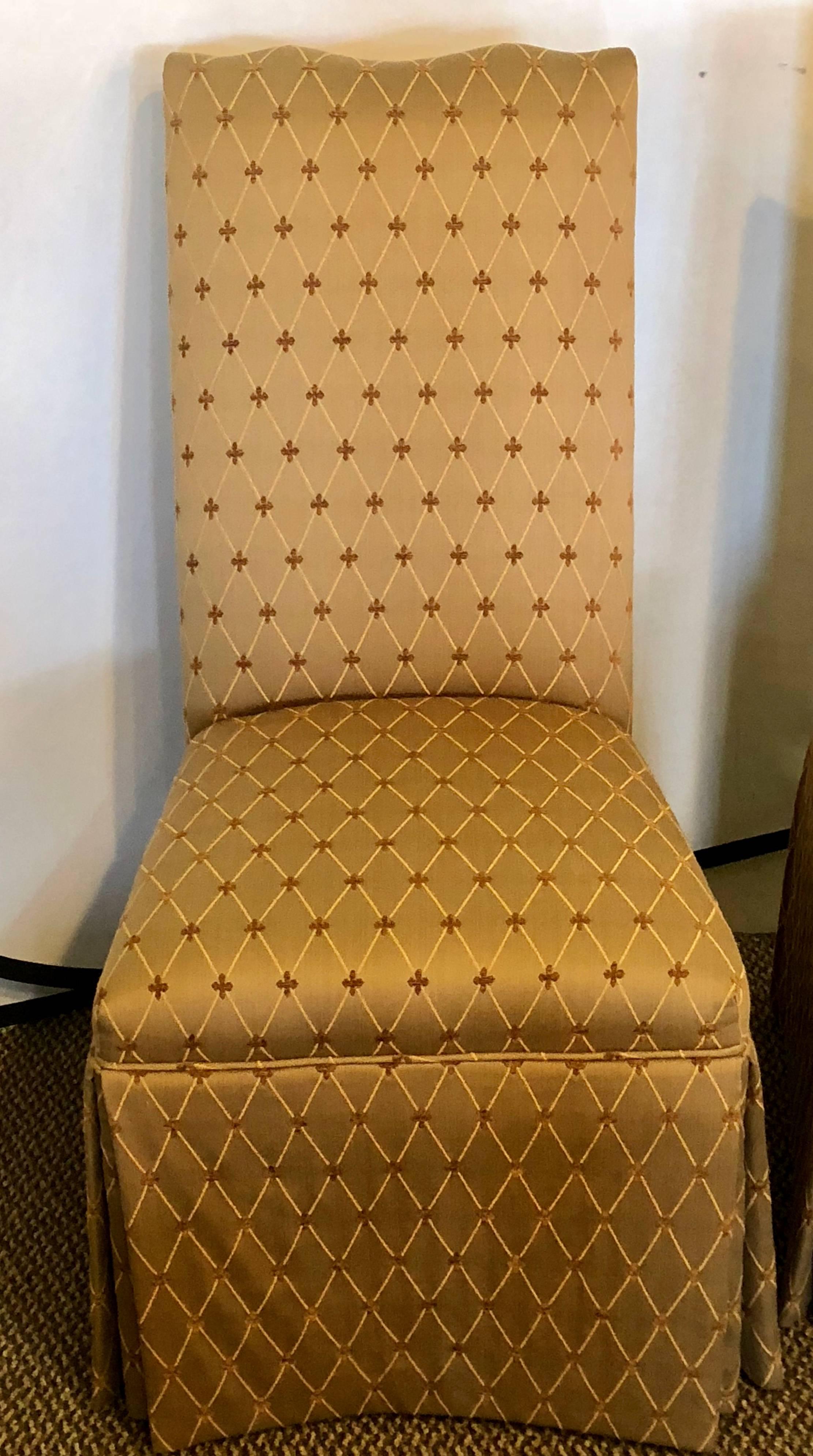 Pair of Hollywood Regency style side chairs in fine custom covered upholstery. Each of these highly decorative side or office chairs are certain to make a screaming statement in any setting. The fine upholstery seem to be new and most likely never