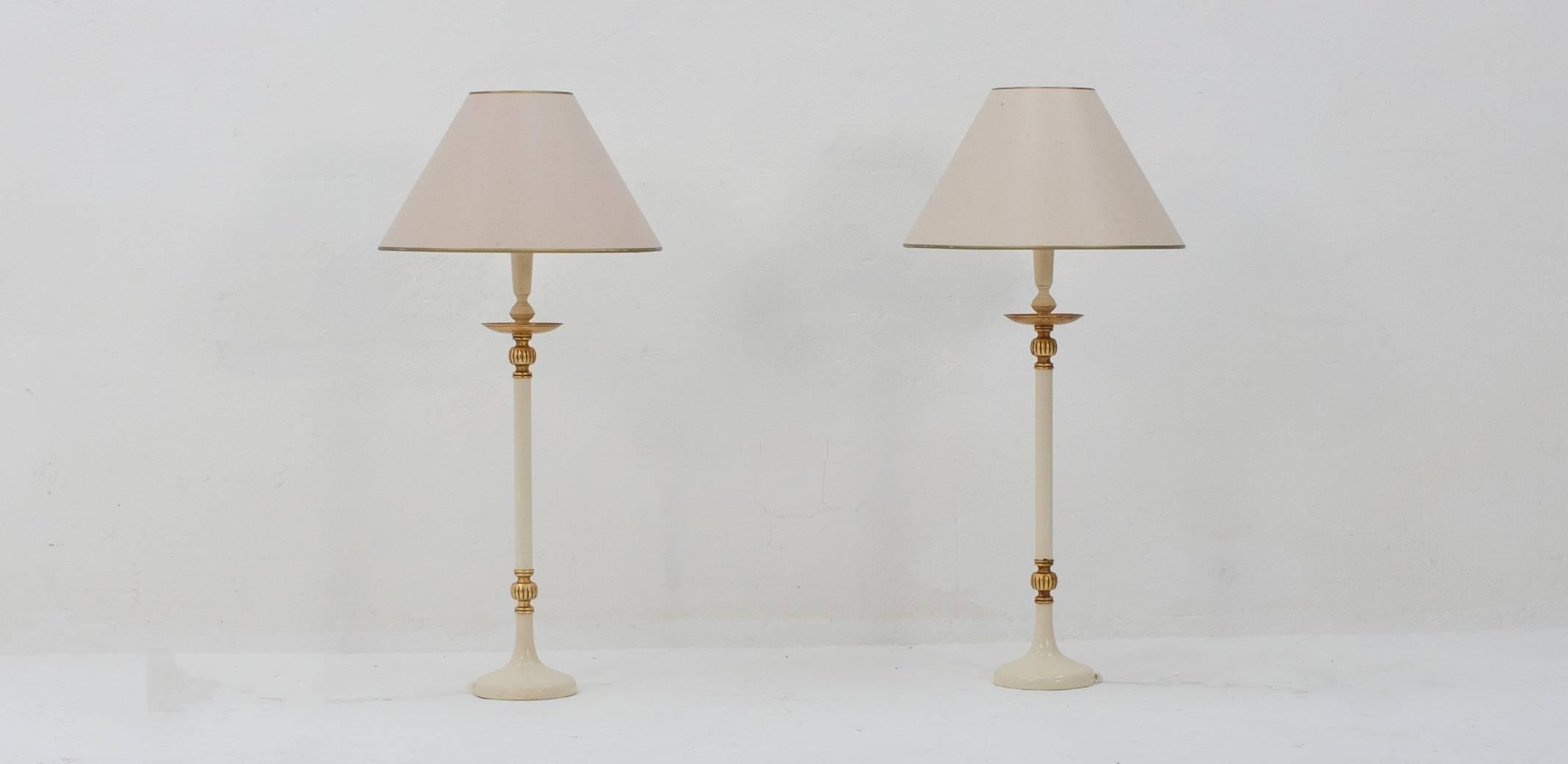 Two classic Hollywood Regency style lamp bases. Nice condition and fully metal construction, made in Italy in the 1970s. We have the lamp shades as well but they're faded unevenly, leaving them slightly different colors.