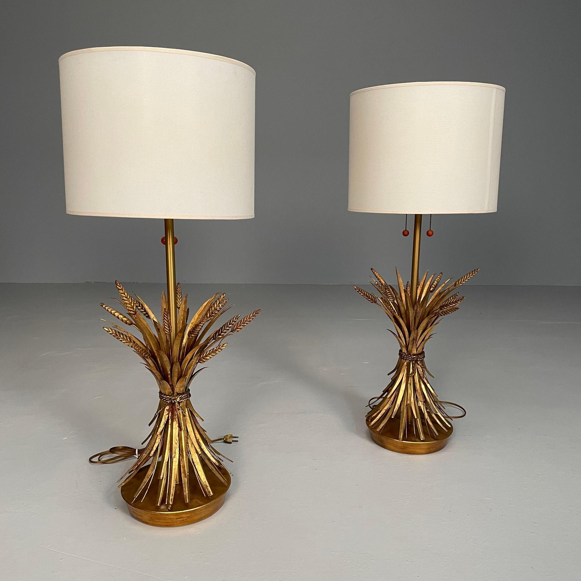 Pair of Hollywood Regency Style Wheat Sheath Table / Desk Lamps, Gilt

A fine pair of wheat table or desk lamps by Marbro Lamp Company. Wheat frame of lamp is 22 inches. Lamps come without shades.

Gilt Metal
United States, c. 1980s
By The Marbro