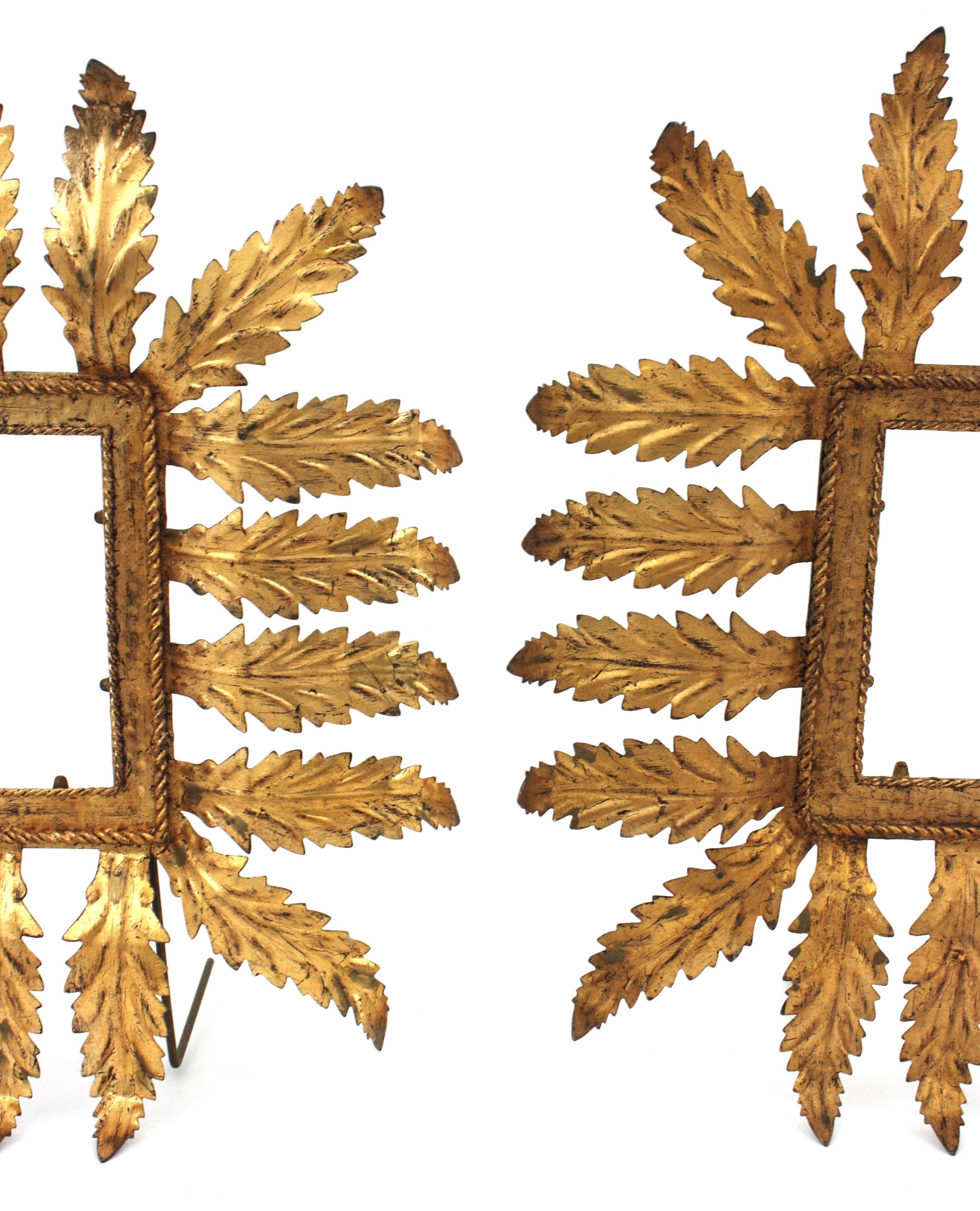 Hand-Crafted Pair of Hollywood Regency Sunburst Foliage Picture Frames in Gilt Iron For Sale