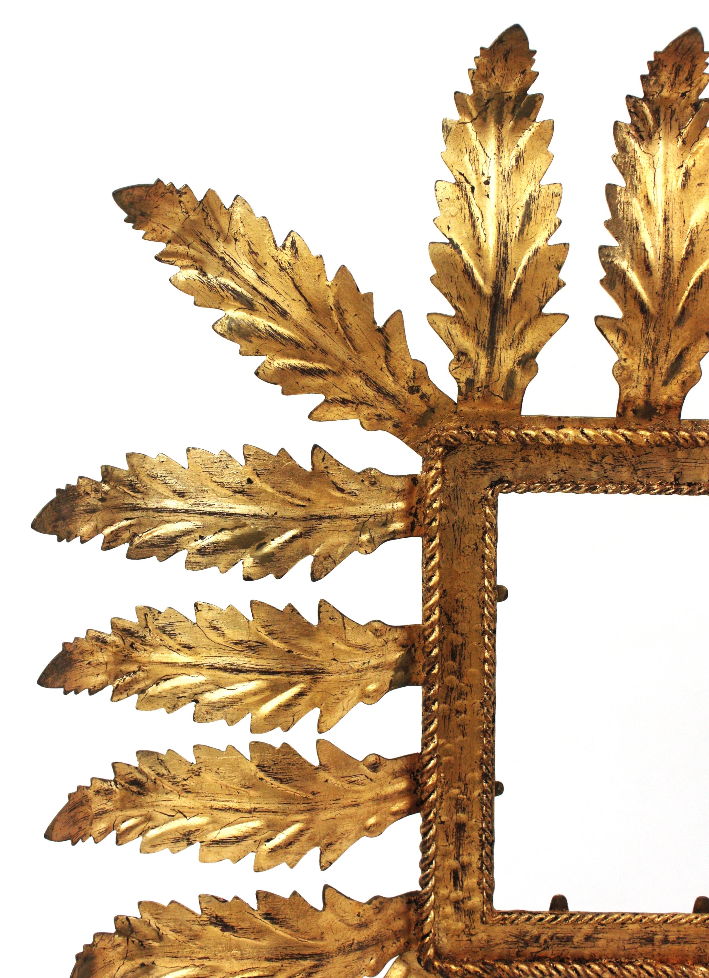 20th Century Pair of Hollywood Regency Sunburst Foliage Picture Frames in Gilt Iron For Sale