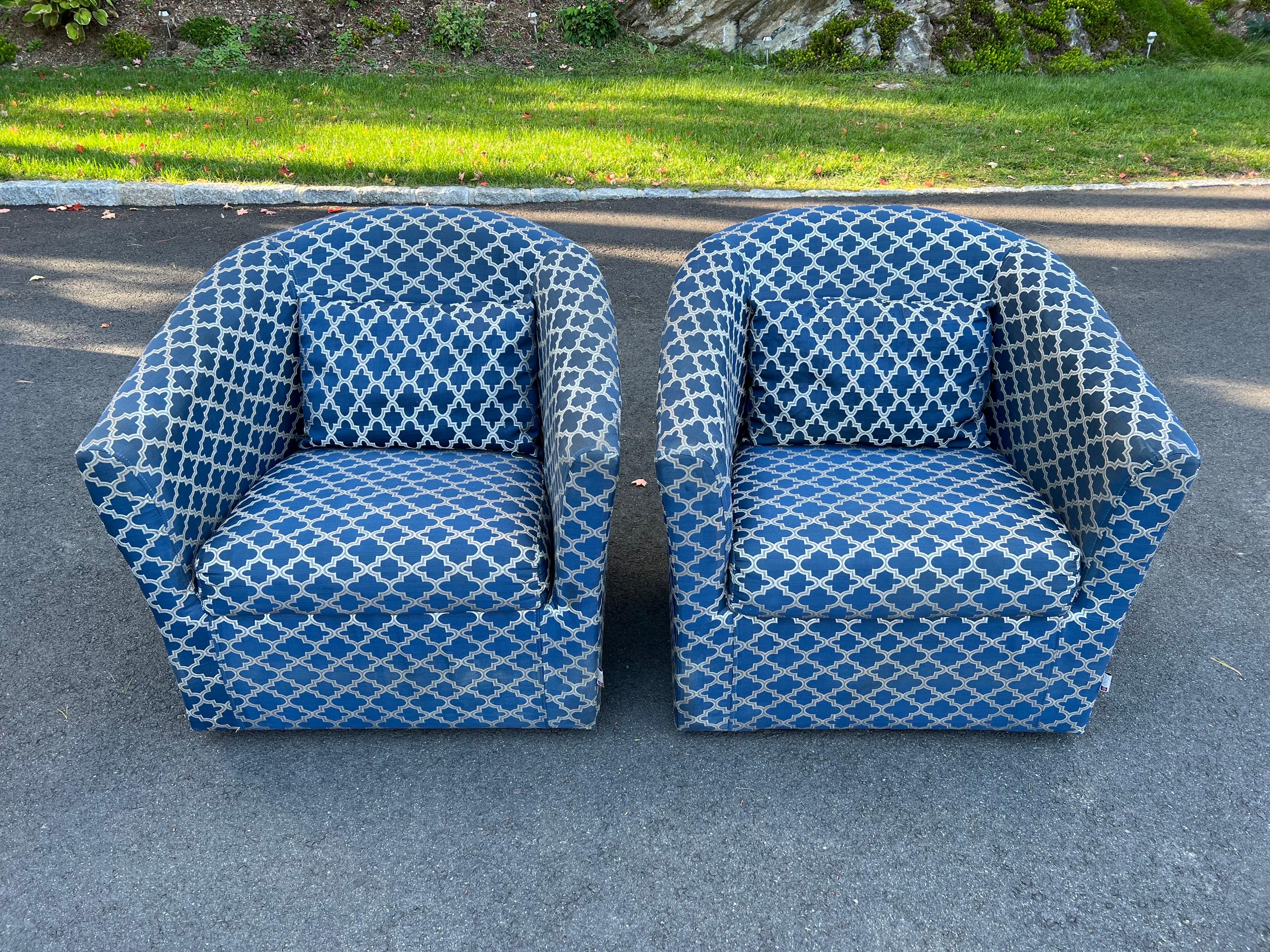 Pair of Hollywood Regency Swivel club chairs. Nice geomtric pattern in blue and white / silver. Nice oversized scale cube chairs. Contemporaty design but Mid century feel.