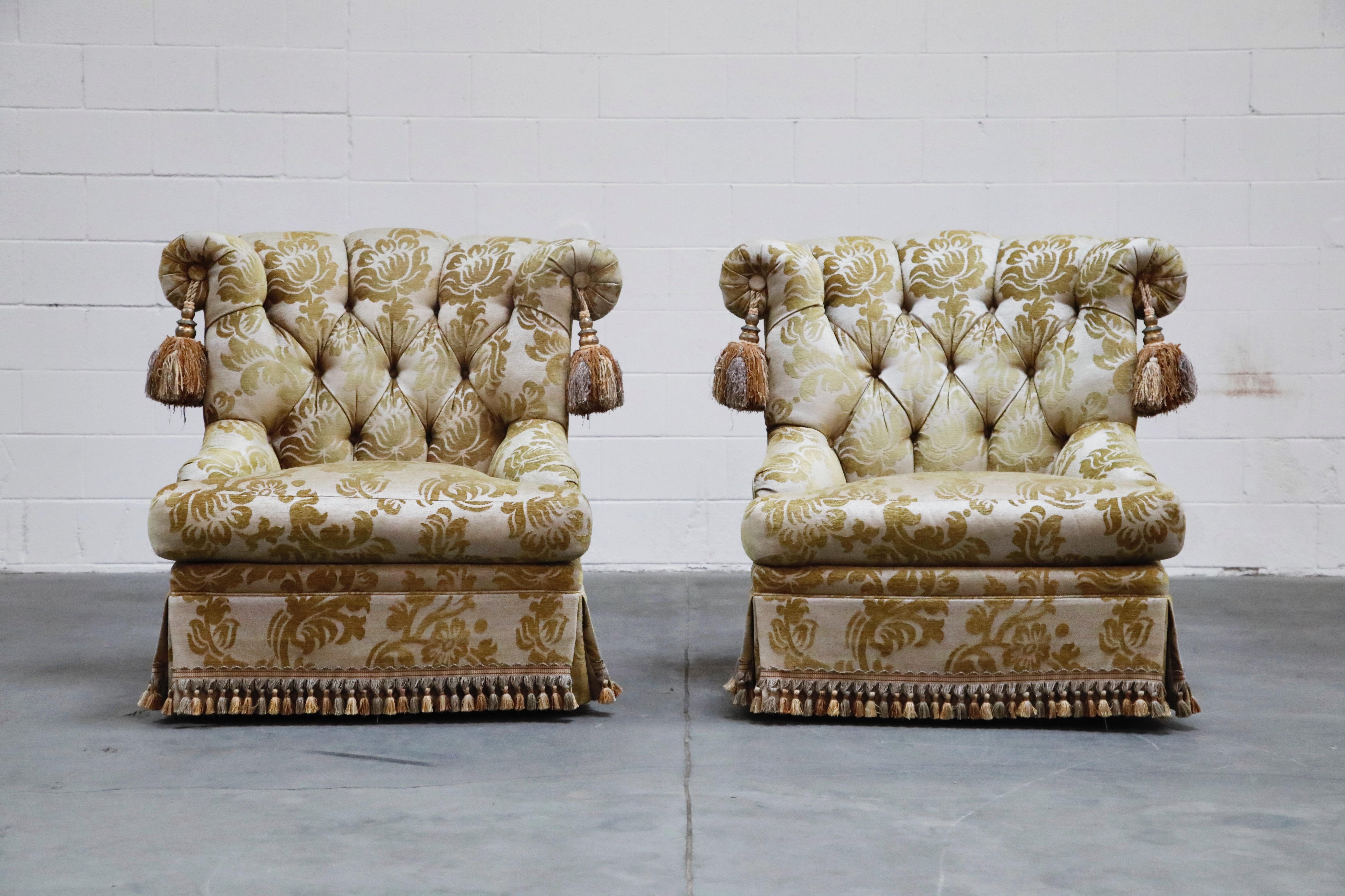These tufted slipper lounge chairs by Erwin Lambeth for Tomlinson are so incredible, from the gorgeous cut velvet upholstery to the fringe base borders and large oversized coordinating tassels to the ornate floral pattern to the deeply tufted