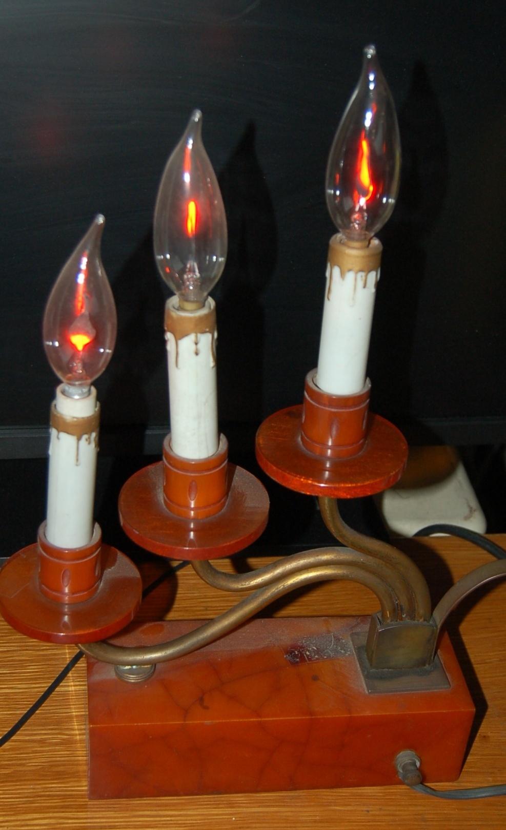 Mid-20th Century Pair of Hollywood Regency Three Candle Bakelite and Brass Table Lamps For Sale