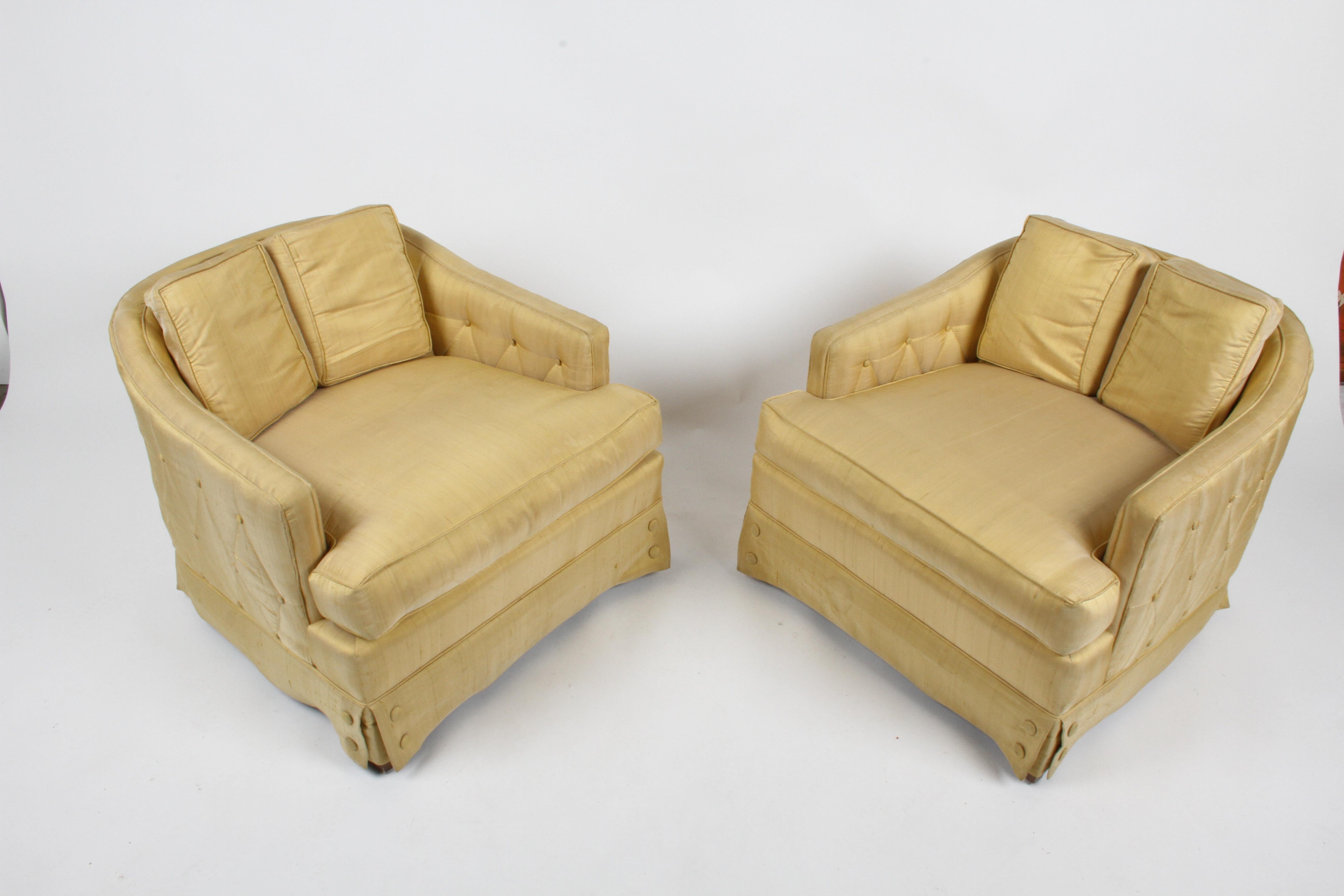 A pair of very sophisticated and elegant lounge chairs with silk diamond tufted outer panels and large buttons on skirts, with down seat cushions, by Tomlinson as part of their Parkway Terrace Collection c. 1962. Set includes original single ottoman