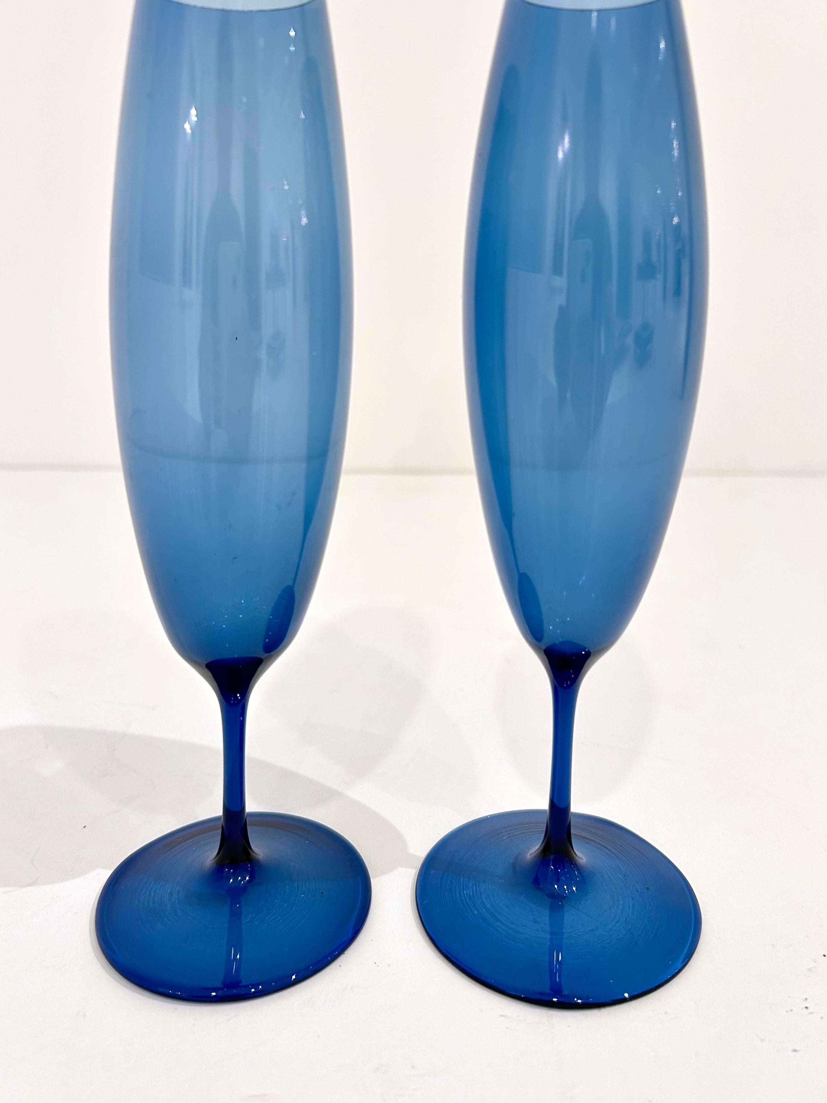 Pair of deep blue Holmegaard glass flutes by Per Lutken.
Great condition. No chips