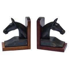 Pair of horse head bookends by Hermès