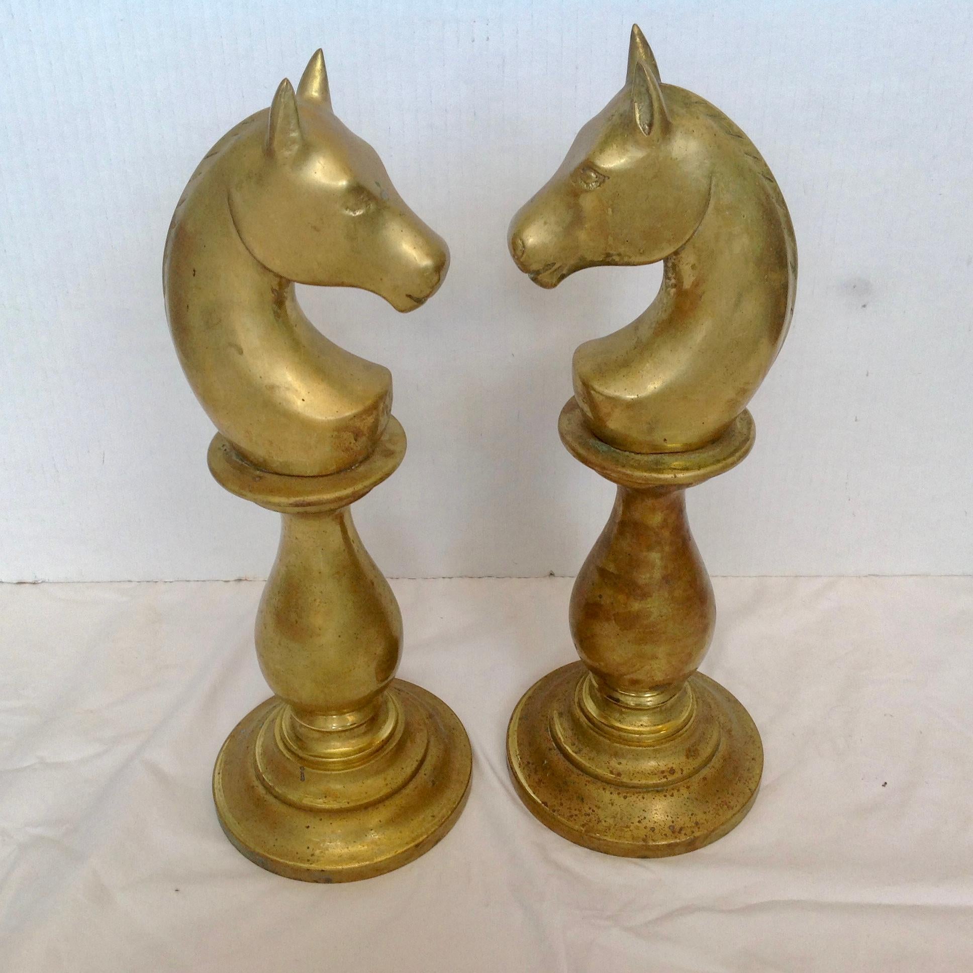 16 1/2 inches tall solid brass - elegantly fashioned and heavy weight.
An outstanding vintage pair.