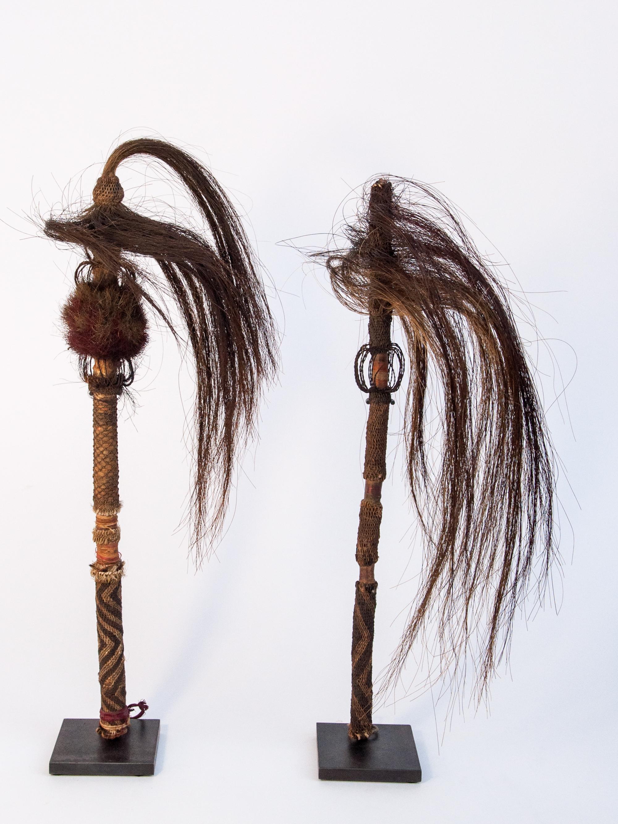 Pair of horsehair fly whisks. Yi of Yunnan, China, early to mid-20th century. Mounted on metal stands. Incorporating twining and braiding techniques.
Dimensions:
Left - 18 inches tall by approx 6.5 inches wide by 5.5 inches deep. The plate is