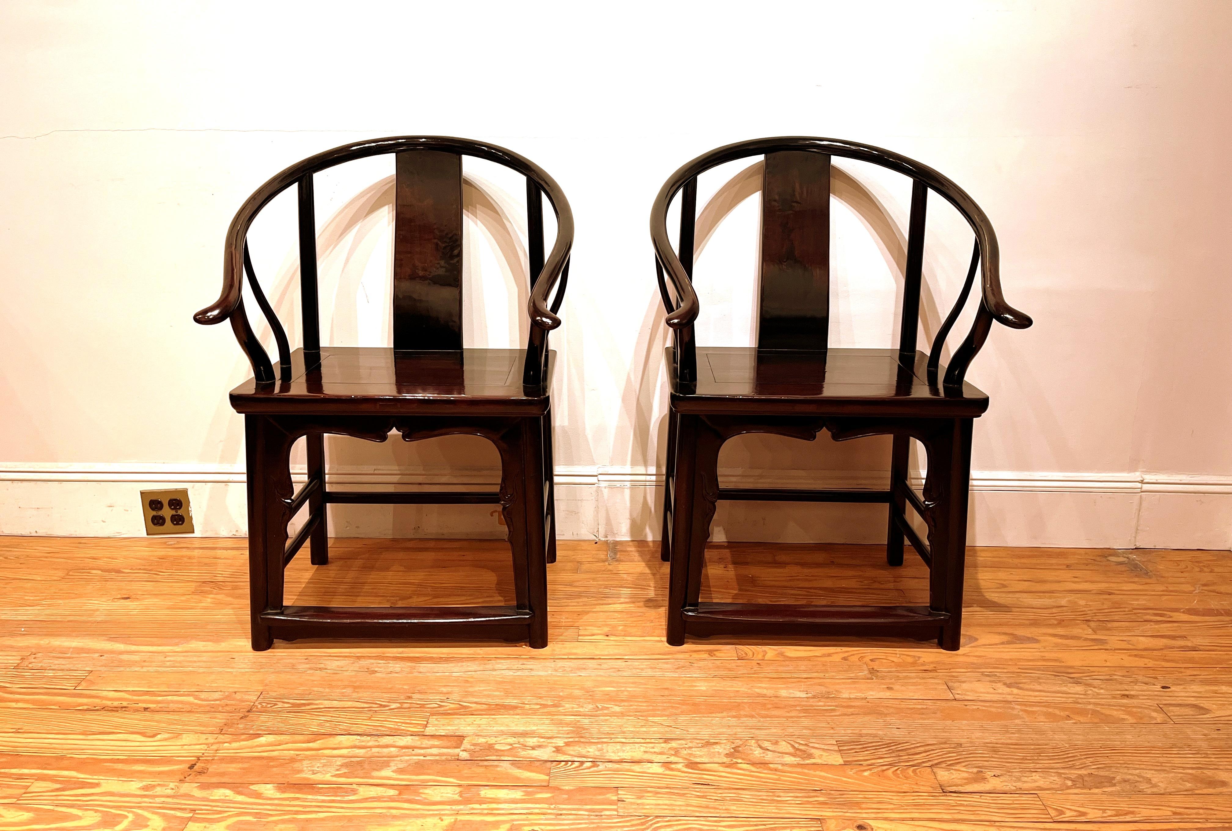 A pair of elegant horseshoe back armchairs. Beautiful form and lines. We carry fine quality furniture with elegant finished and has been appeared many times in 