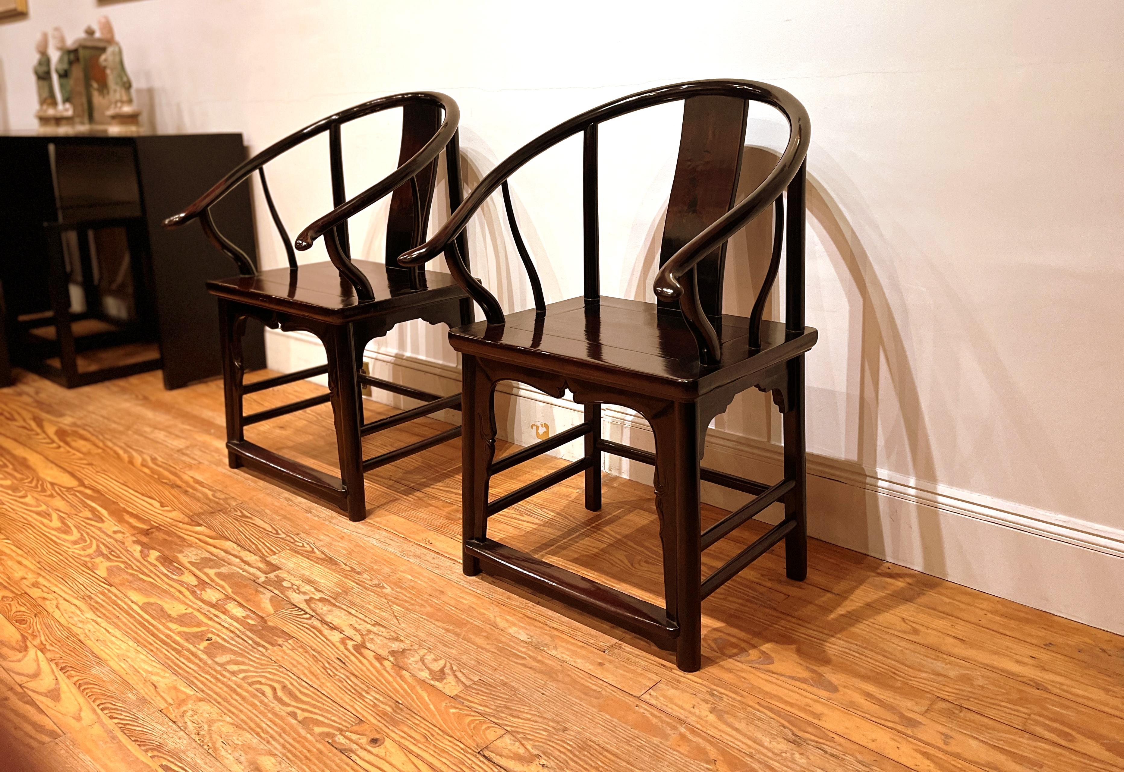 Polished Pair of Horseshoe Back Armchairs For Sale
