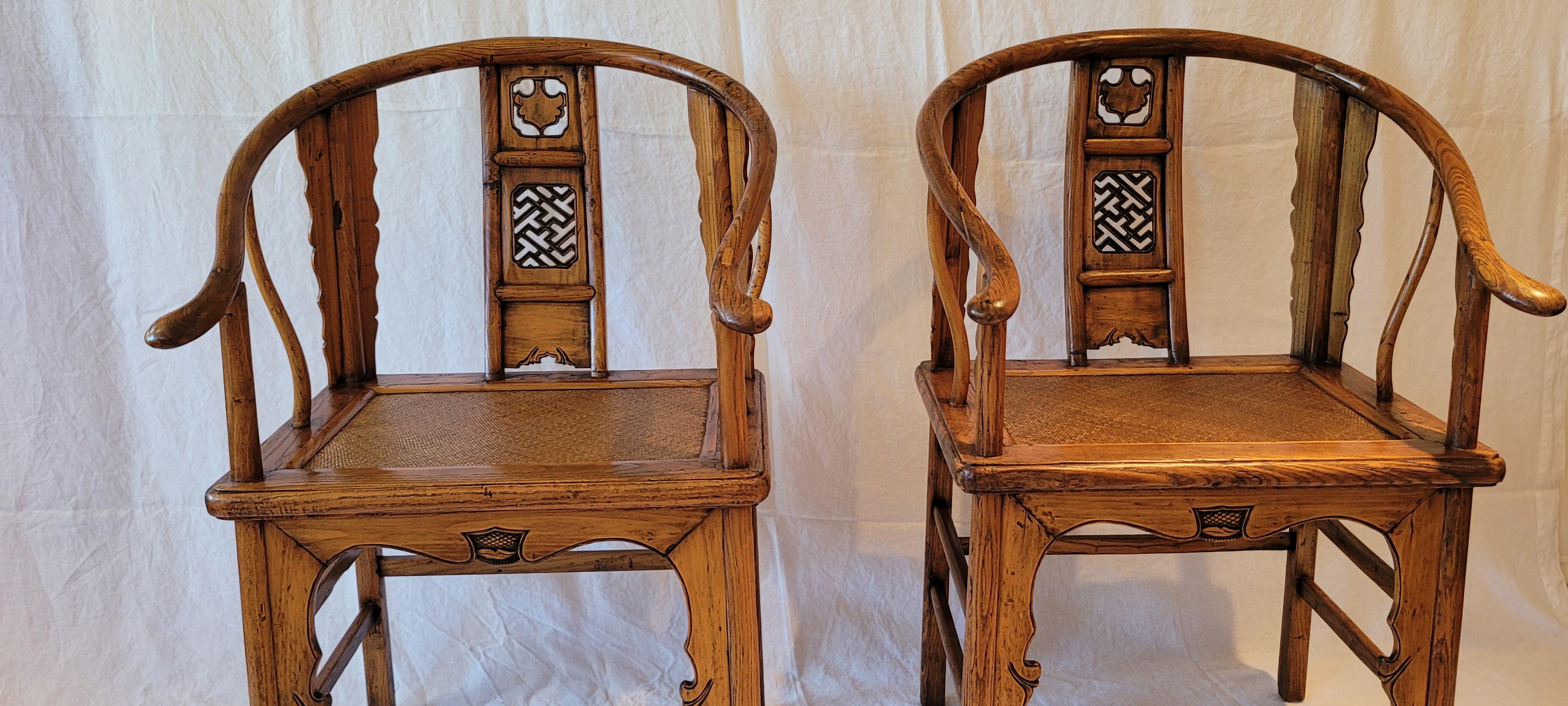 A pair of 19th Century Horseshoe Back Armchairs
The armrests are composed of three separate pieces joined together by half-lap joints locked with pressure pegs set an an angle.  The long narrow flanges, fitted to both sides of the front and back