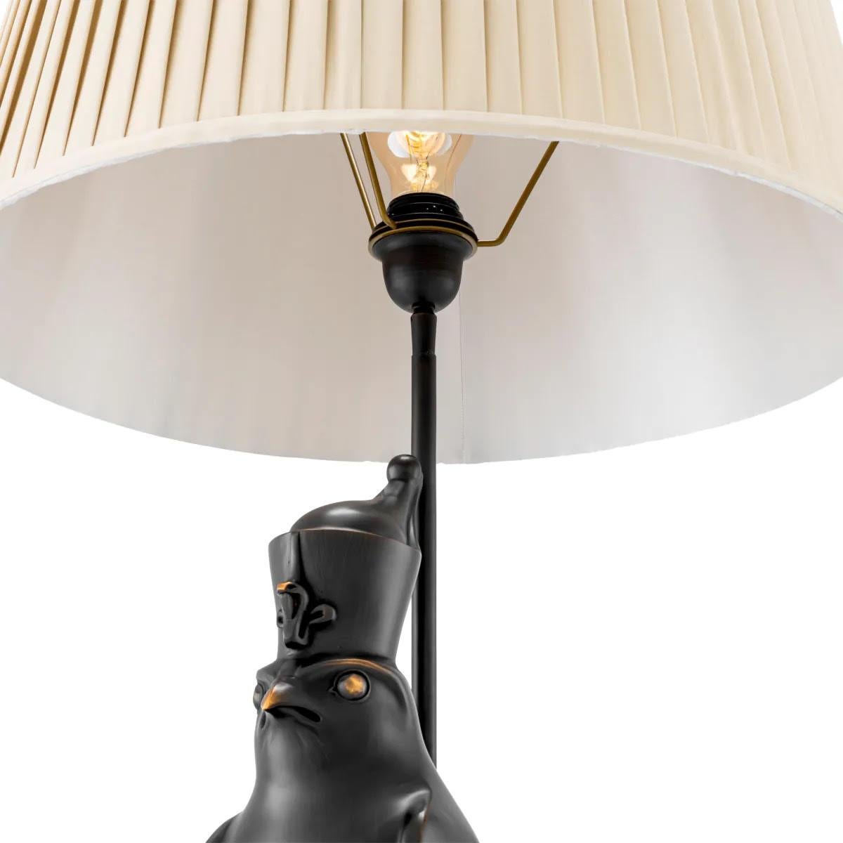 Patiné Paire de lampes de table Horus Modèle, bronze patiné. en vente