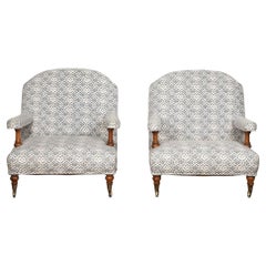 Pair of Howard and Sons Open Armchairs