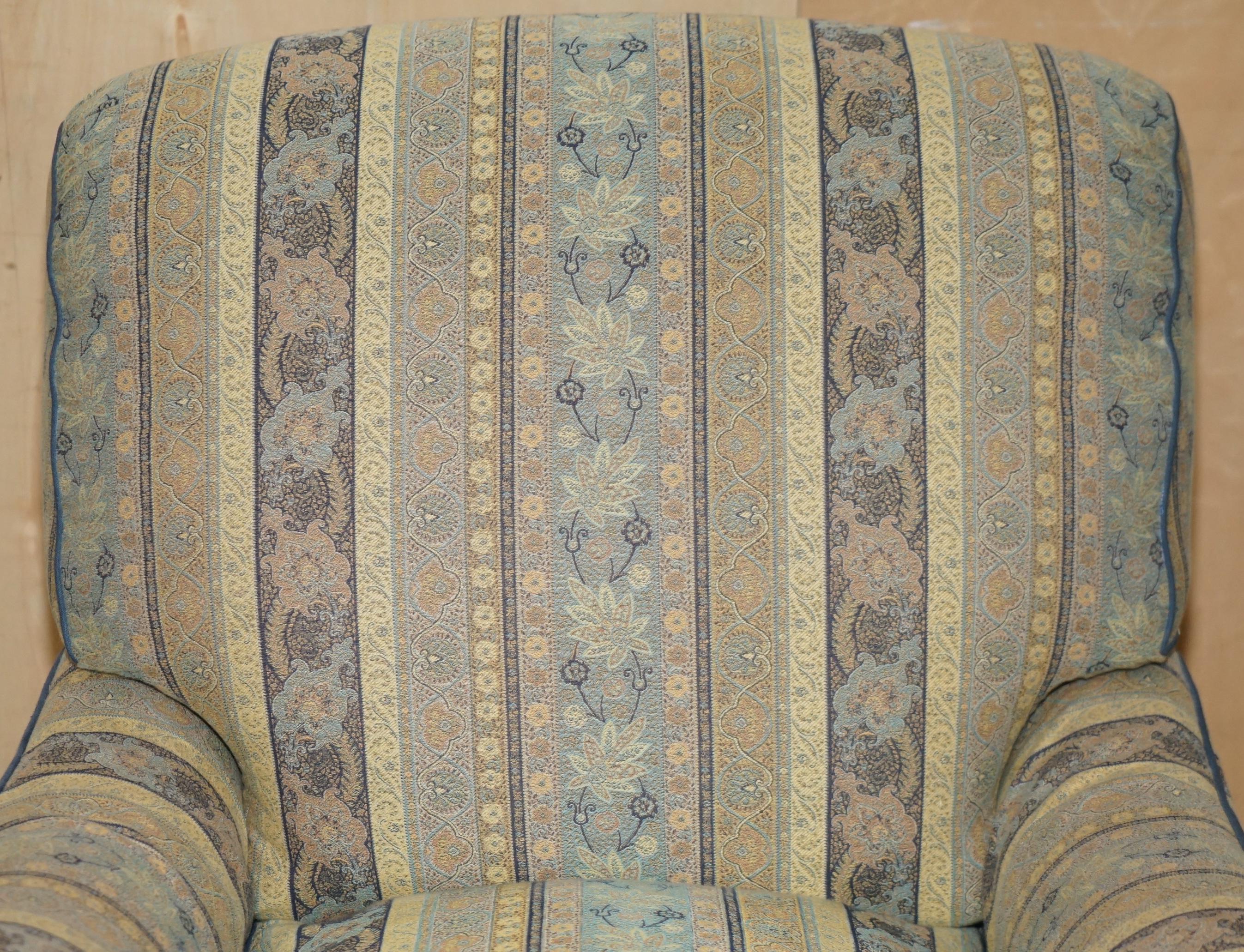 Upholstery PAIR OF HOWARD & SON'S BRIDGEWATER MODEL EASY ARMCHAiRS WITH FULL STAMPED LEGS For Sale