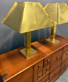 pair of huge and heavy brass table lamps att. curtis jere