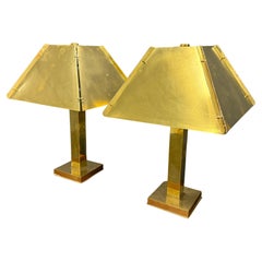 pair of huge and heavy brass table lamps att. curtis jere