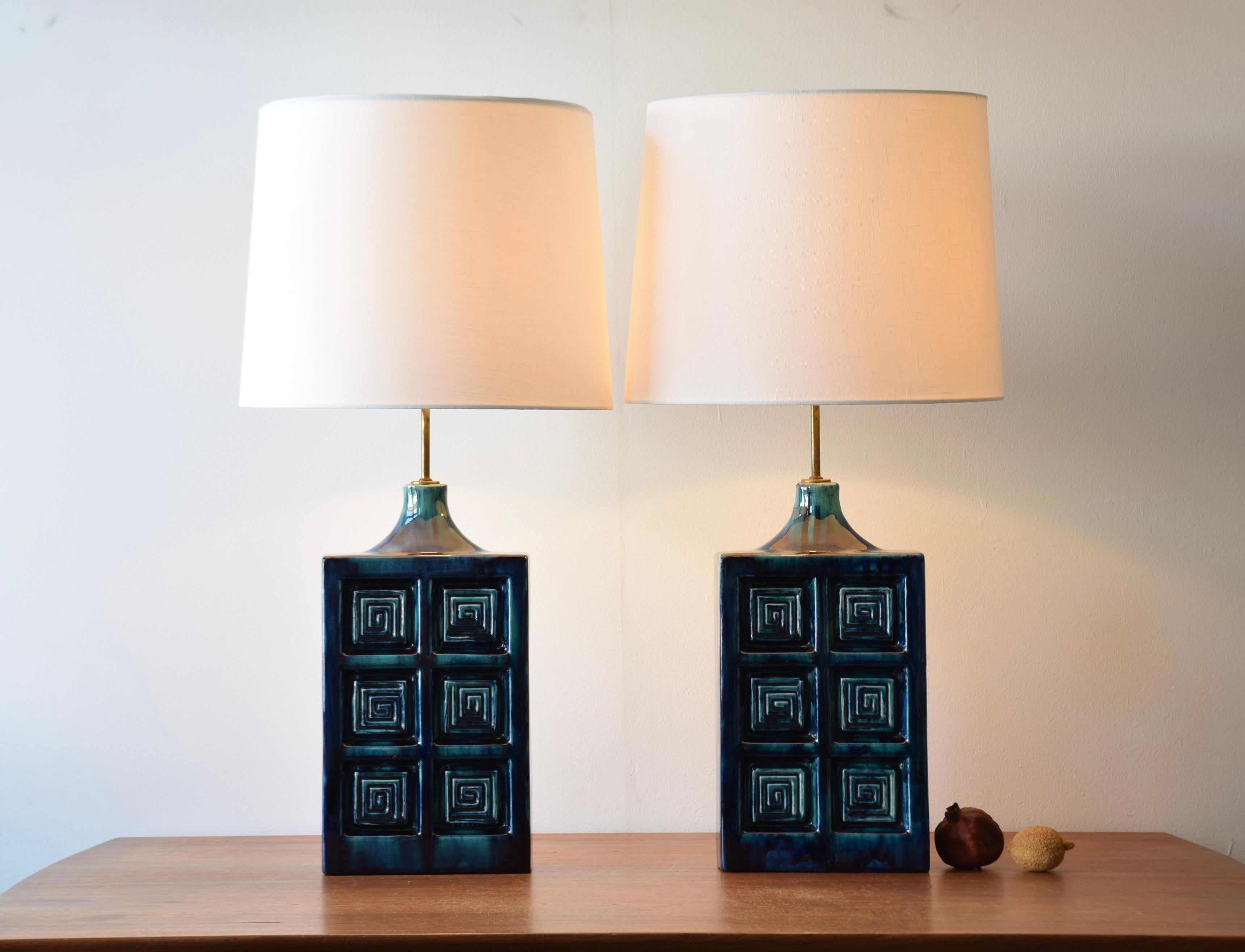 Pair of huge Midcentury Danish table lamps from the ceramic workshop S. Holstein. Manufactured circa 1960s.

The glaze is vivid with a mix of blue and turquoise. The front is decorated with a repeated geometric decor. On top of the ceramic bases