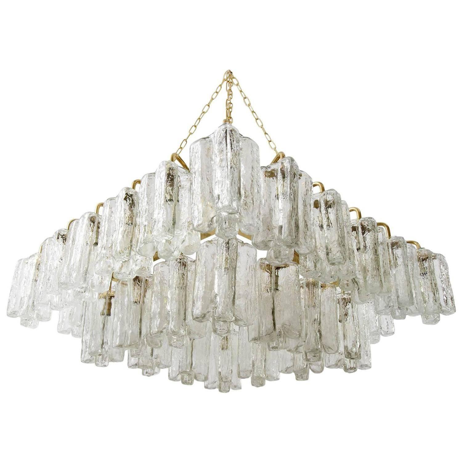 One of two square and very large 'Granada' light fixtures by J.T. Kalmar, Austria, manufactured in midcentury, circa 1970 (late 1960s-early 1970s).
The lamps can be used as pendant light / chandelier or as flush mount light because they can be hung