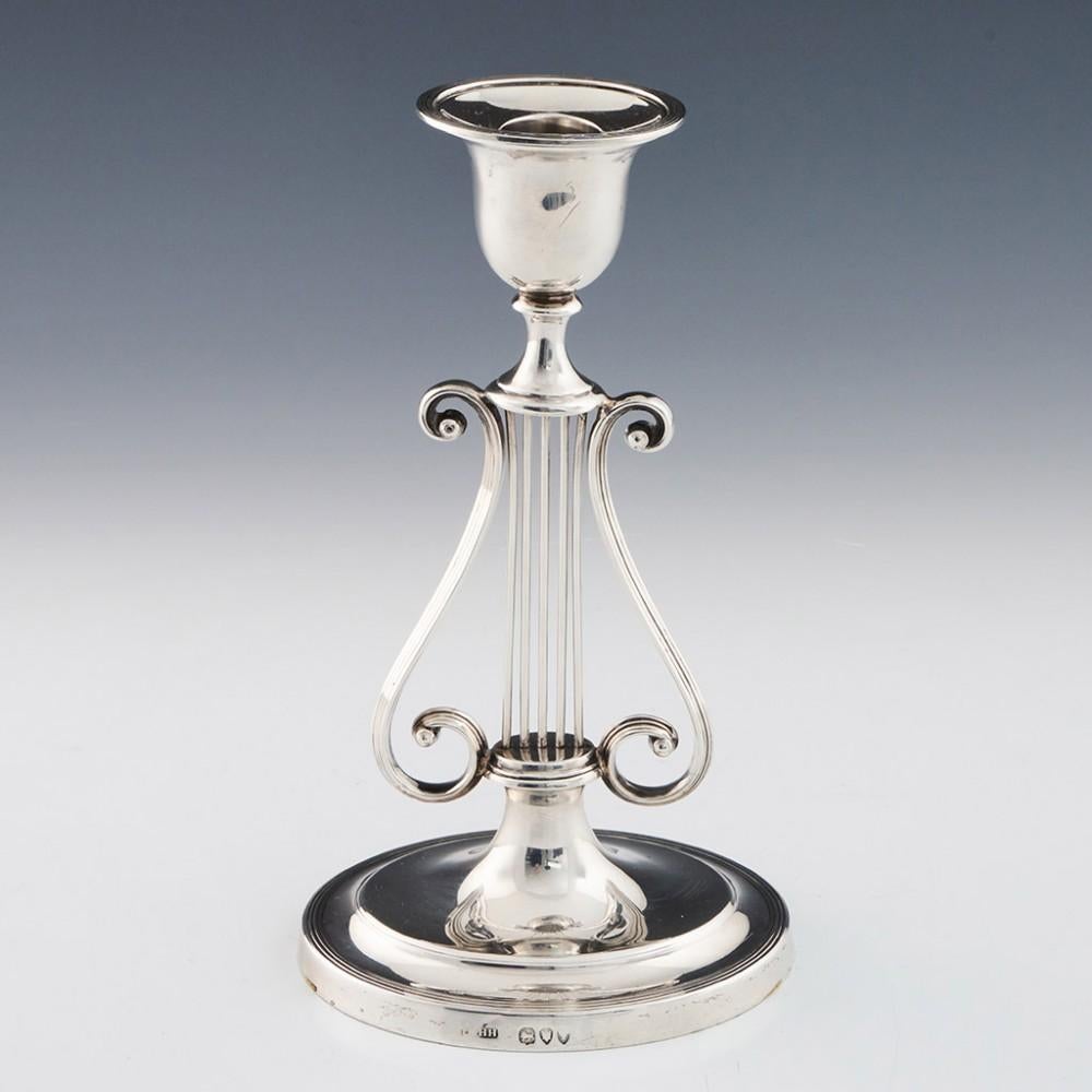 Pair of Hukin and Heath Sterling Silver Candlesticks London, 1894

Additional information:
Date : Hallmarked in London in 1894 for Hukin and Heath
Period : Victoria
Origin : London, England
Decoration : Detachable sconces over lyre shaped