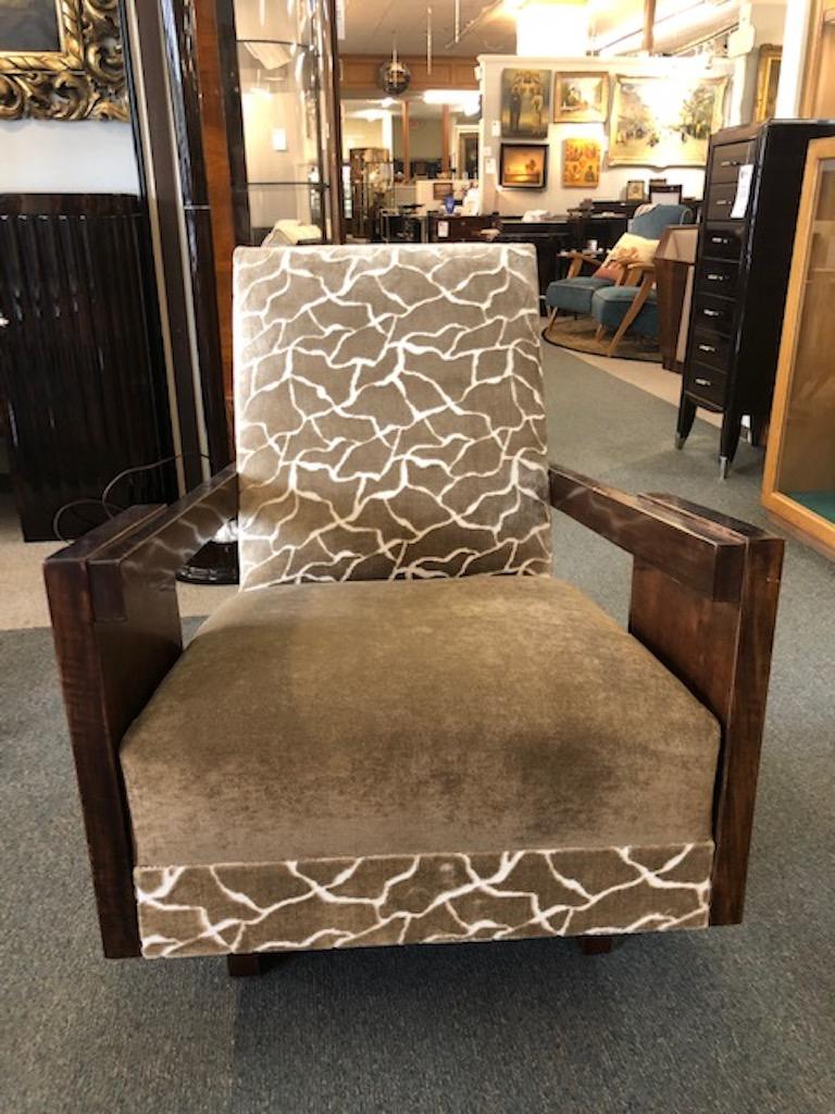 Chair is re-upholstered with light brown fabric. It has 2 armrests that are connected to the flat wide panels on the each side of the chair. It is elevated by 4 short rectangular legs. 

Condition is perfect.

Hungarian, circa 1930s

 Measures: