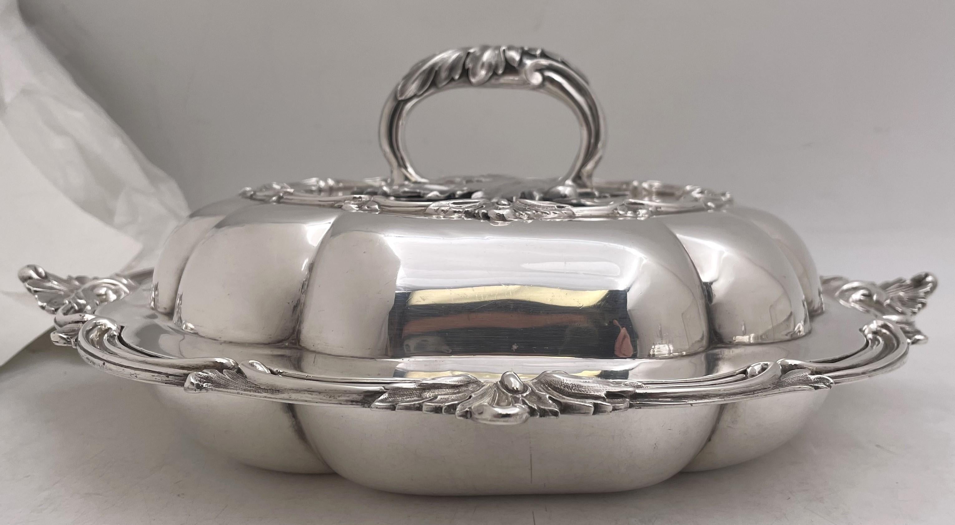 John Samuel Hunt, English pair of sterling silver multi-lobed covered vegetable dishes from 1850 (Victorian era) adorned with curvilinear natural motifs. They measure 12'' by 12'' by 4 3/4'' in height, weigh 97 troy ounces, and bear hallmarks as