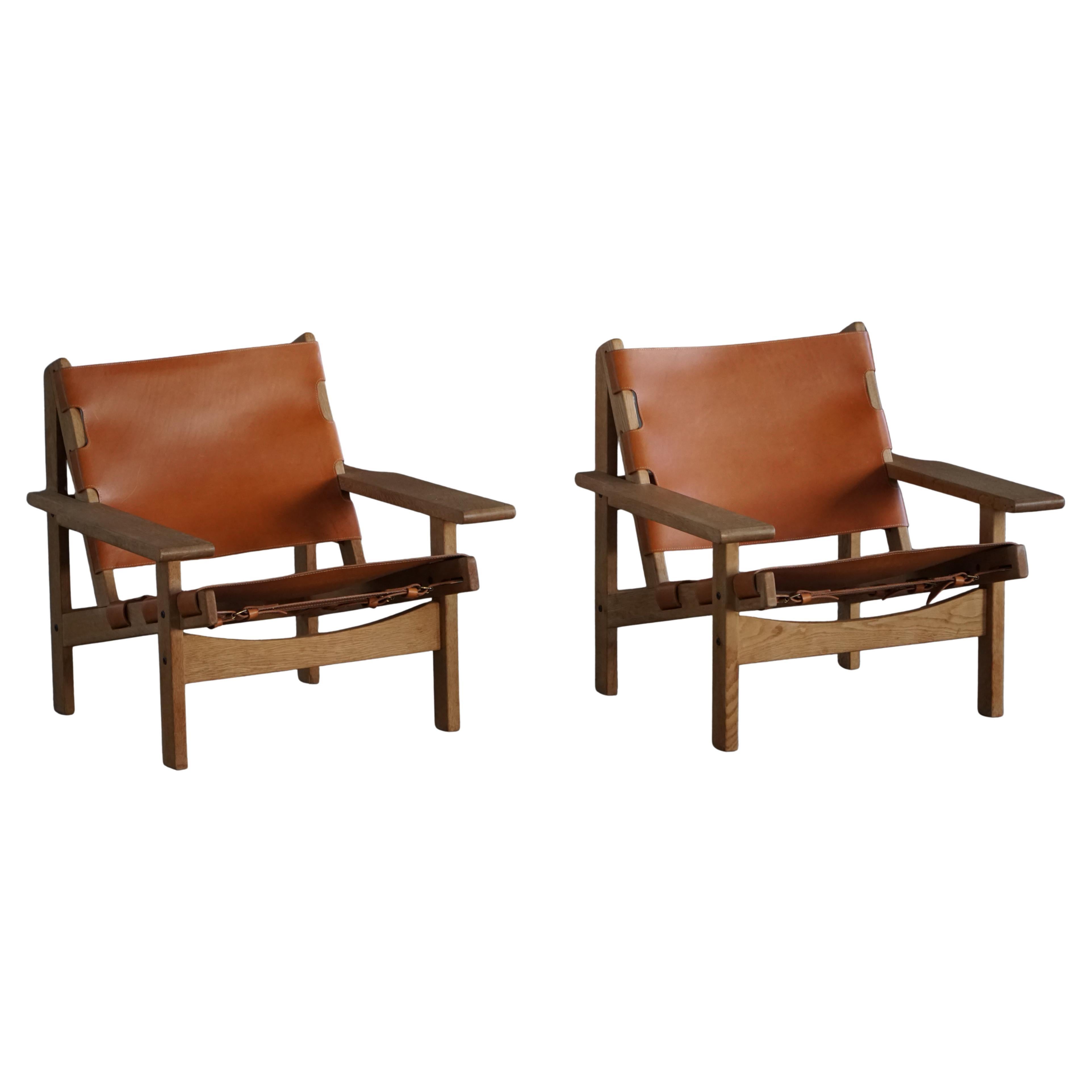 Pair of Hunting Chairs in Oak 
Leather by Kurt Østervig, Danish Modern, 1960s en vente