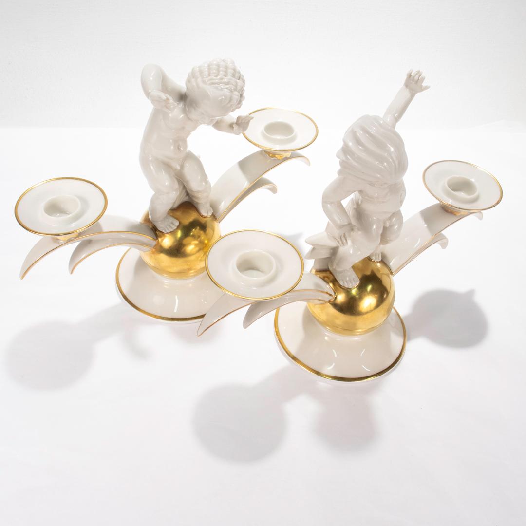 Gilt Pair of Hutschenreuther Art Deco Porcelain Candelabra by K. Tutter with Putti For Sale