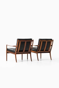 Paire de fauteuils « Samsö » d'Ib Kofod-Larsen, par OPE, années 1950
