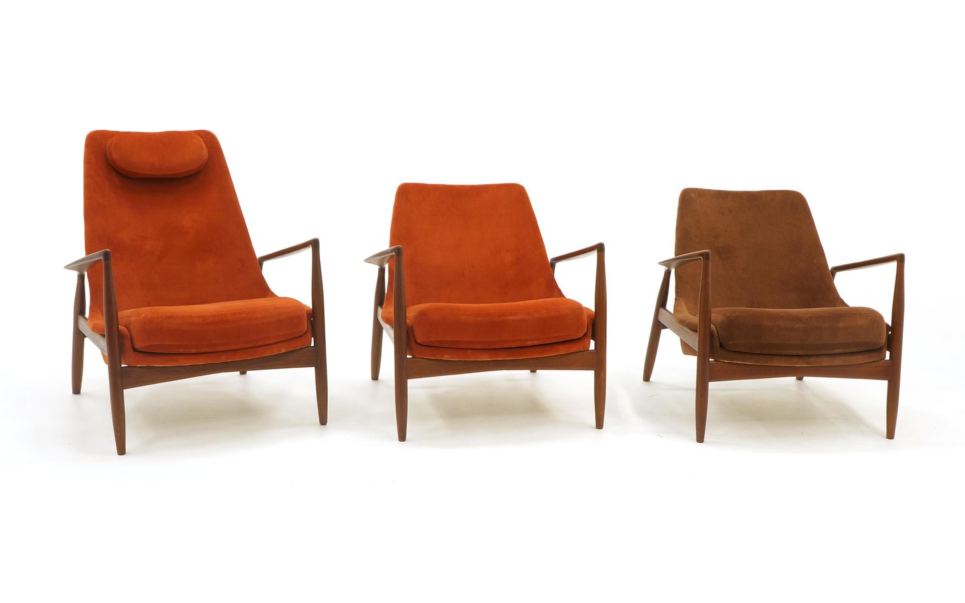 Rare pair of Kofod Larsen Seal chairs by OPE, Sweden, 1960s. One high back and one standard. Both have been recently reupholstered in a burnt orange velvet that feels like suede. Very good to excellent condition.