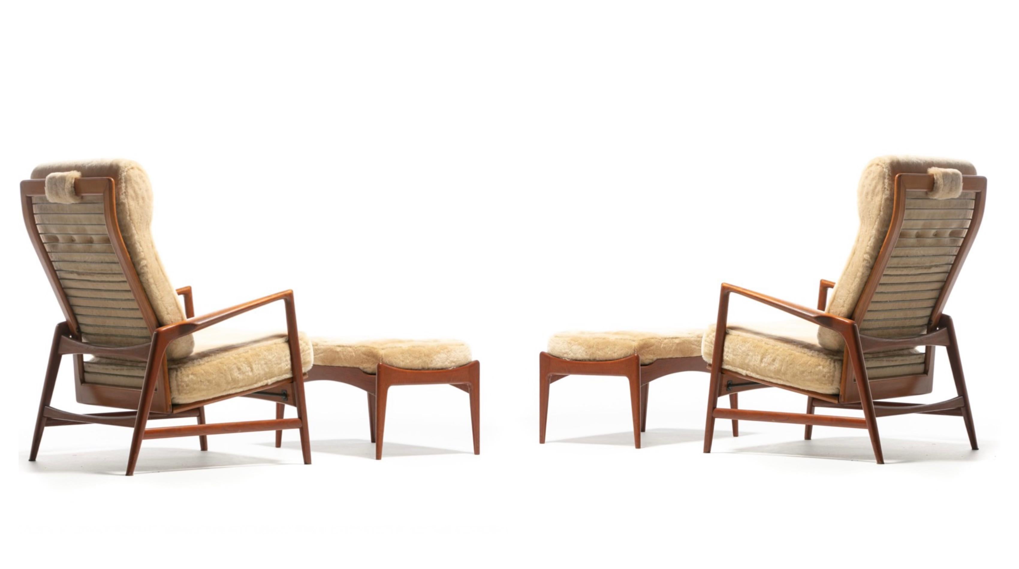 One of a kind pair of beautiful reclining lounge chairs and ottomans designed by Ib Kofod-Larsen for Selig freshly upholstered in hand sewn rich Oatmeal / Ivory Shearling. An early Mid Century Scandinavian Modern design hailing from 1950s Sweden,