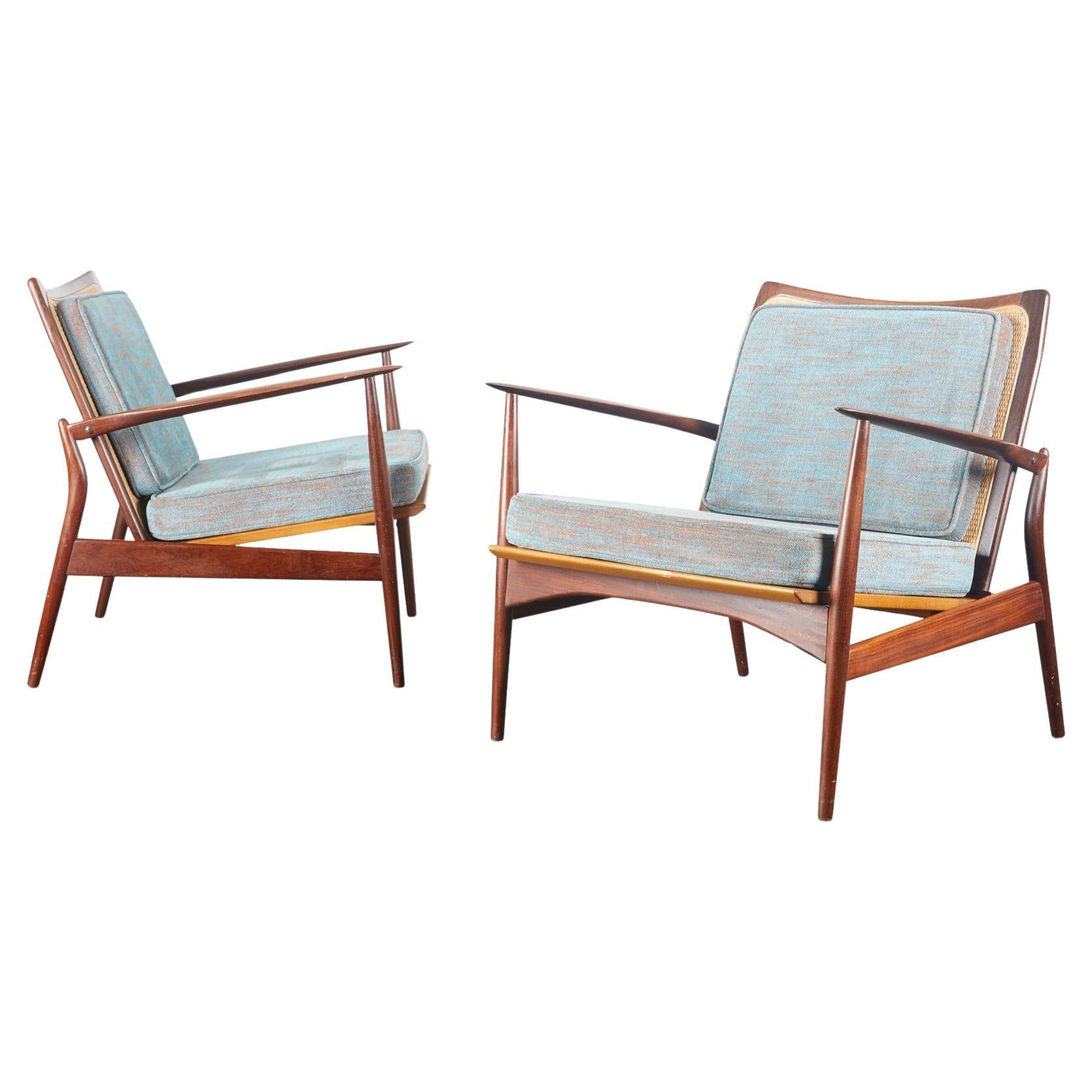Pair of Ib Kofod Larsen Spear Lounge Chairs in Walnut and Cane For Sale