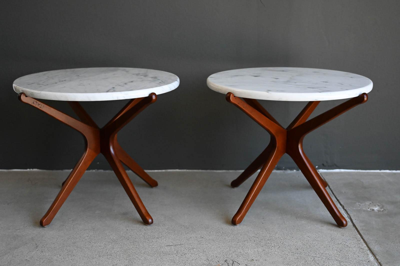 Pair of Ico Parisi Italian Walnut and Marble Side Tables, ca. 1960.  Walnut star bases float on top of the tripod star base with sculpted legs and feet.   Base has been professionally restored and marble is free of cracks and chips.  Beautiful grain
