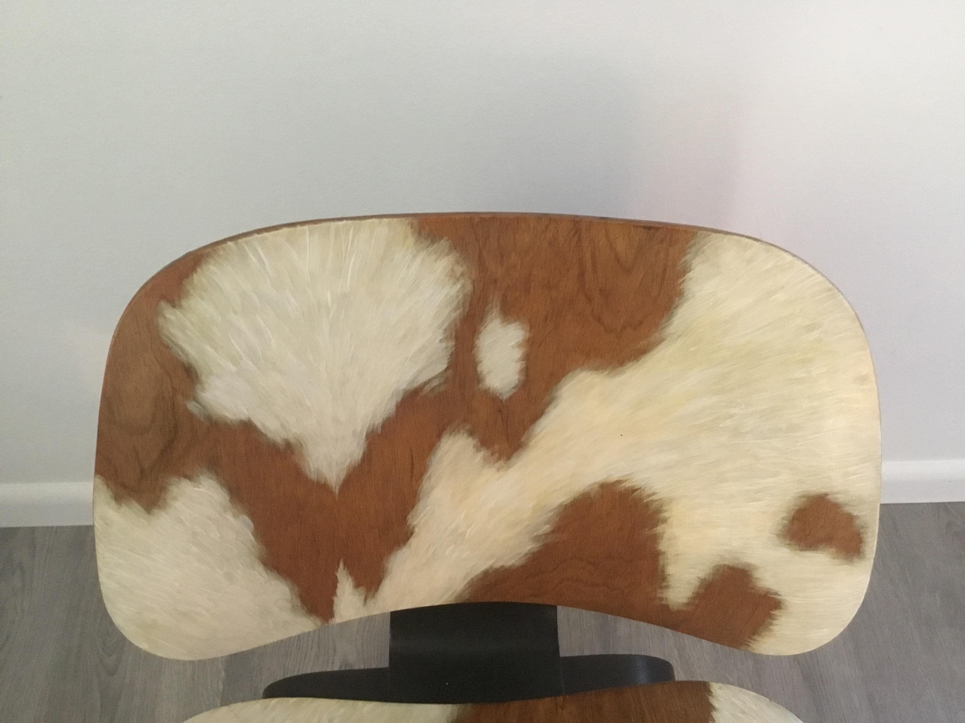 Mid-20th Century Pair of Iconic LCW Eames Chairs with Faux Cowhide Finish by Lynn Curlee