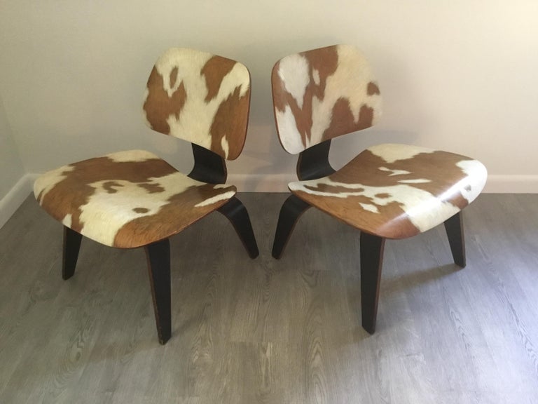Pair Of Iconic Lcw Eames Chairs With Faux Cowhide Finish By Lynn