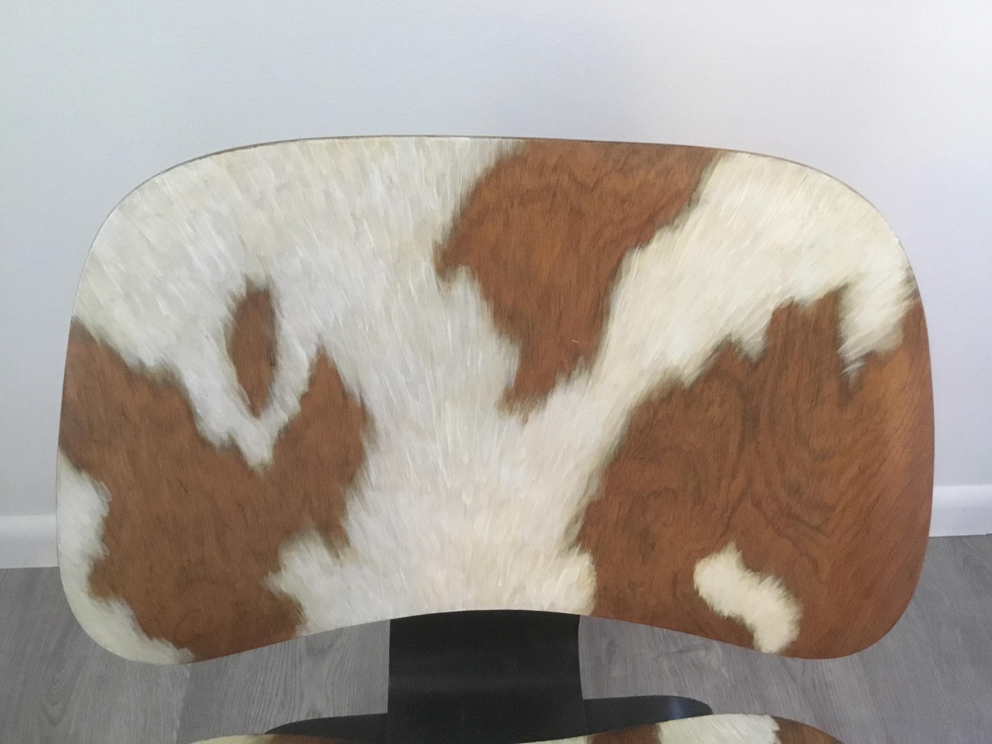 Laminated Pair of Iconic LCW Eames Chairs with Faux Cowhide Finish by Lynn Curlee